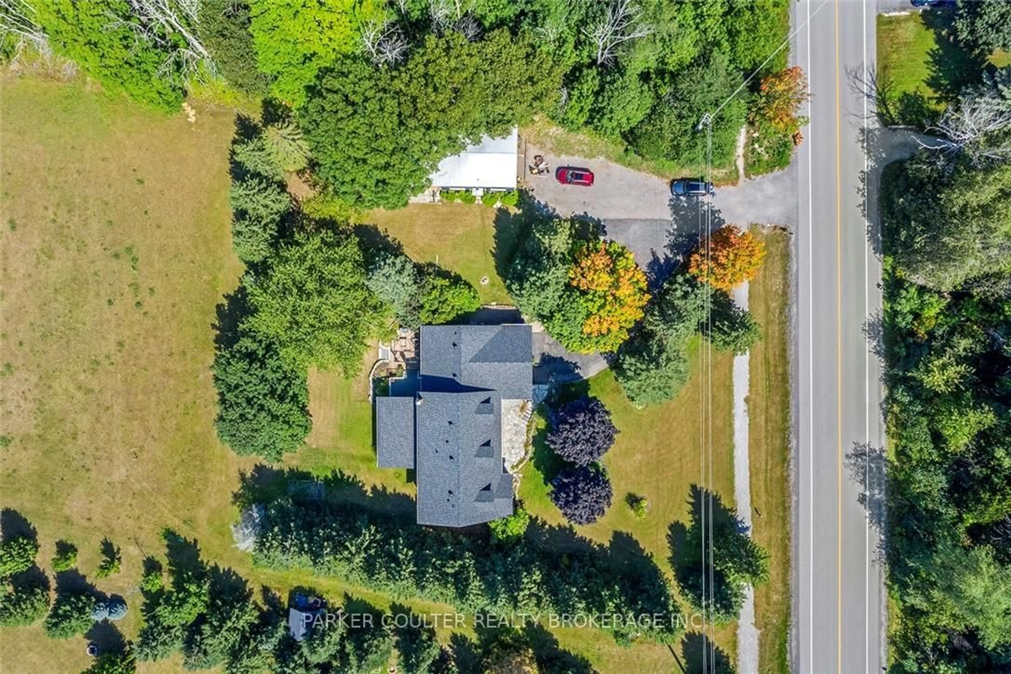 A pic from outside/outdoor area/front of a property/back of a property/a pic from drone, street for 2038 Snow Valley Rd, Springwater Ontario L0L 1Y3