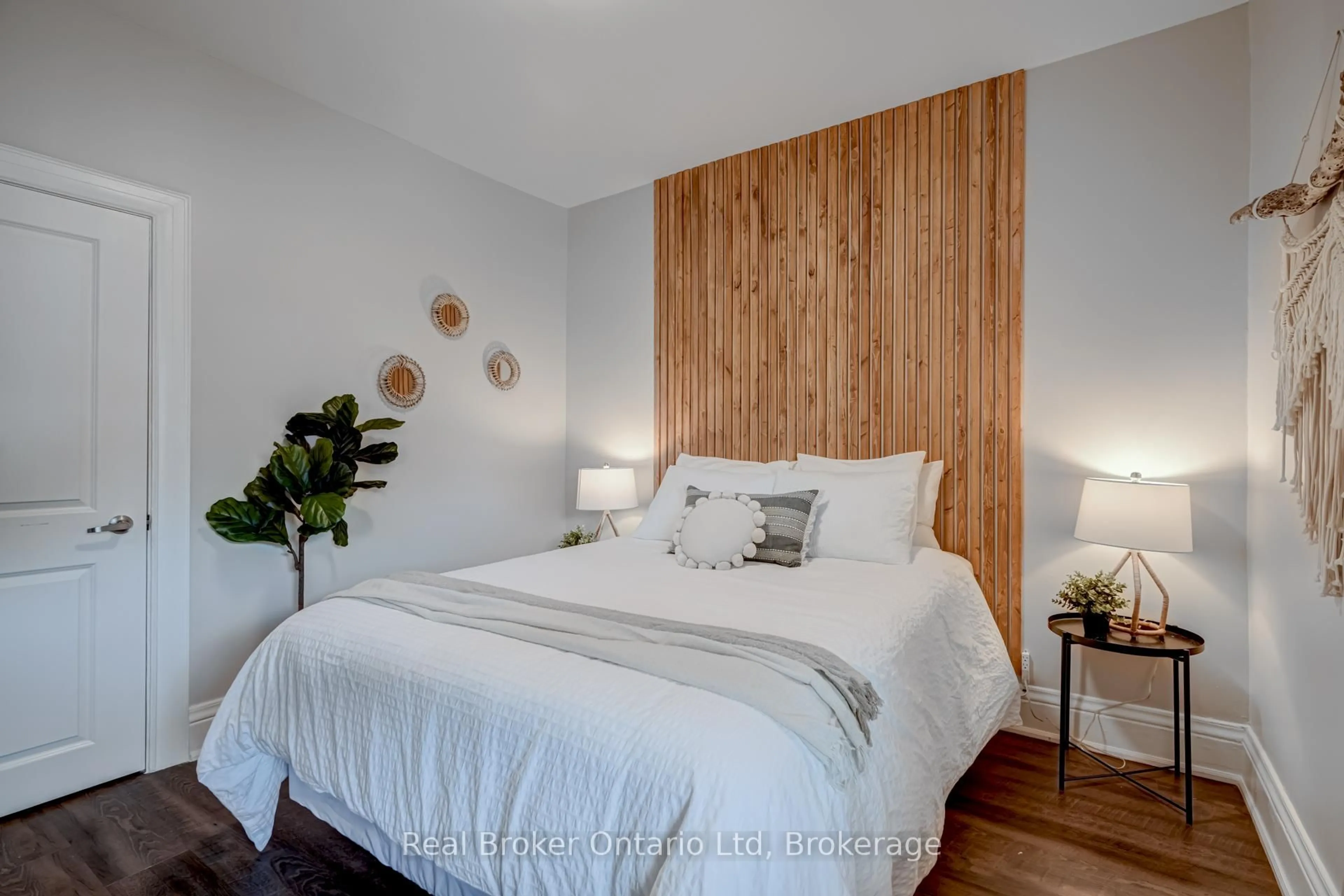 Bedroom with bed, wood/laminate floor for 66 Nottawasaga St, Orillia Ontario L3V 3J4