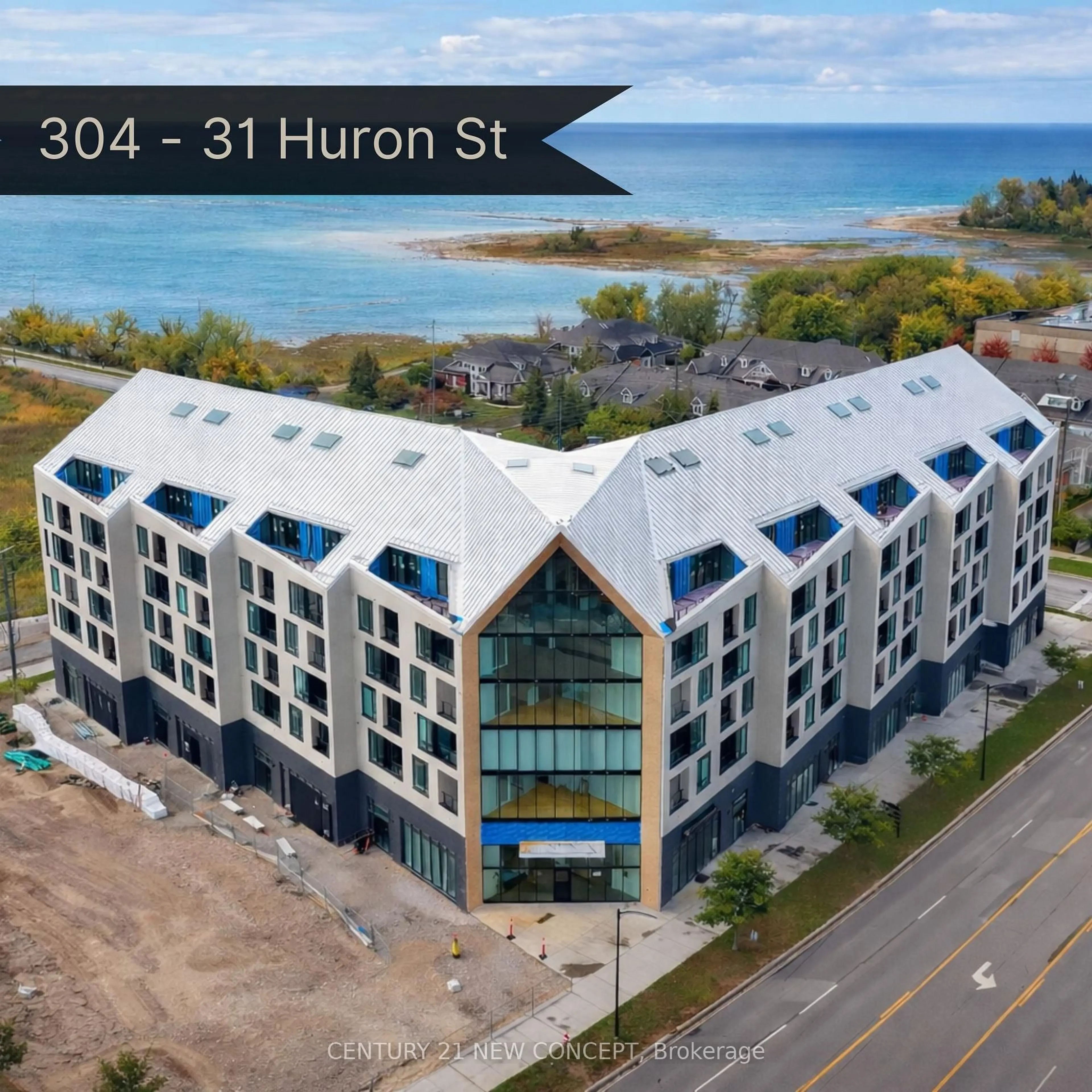 A pic from outside/outdoor area/front of a property/back of a property/a pic from drone, building for 31 Huron St #304, Collingwood Ontario L9Y 0E8