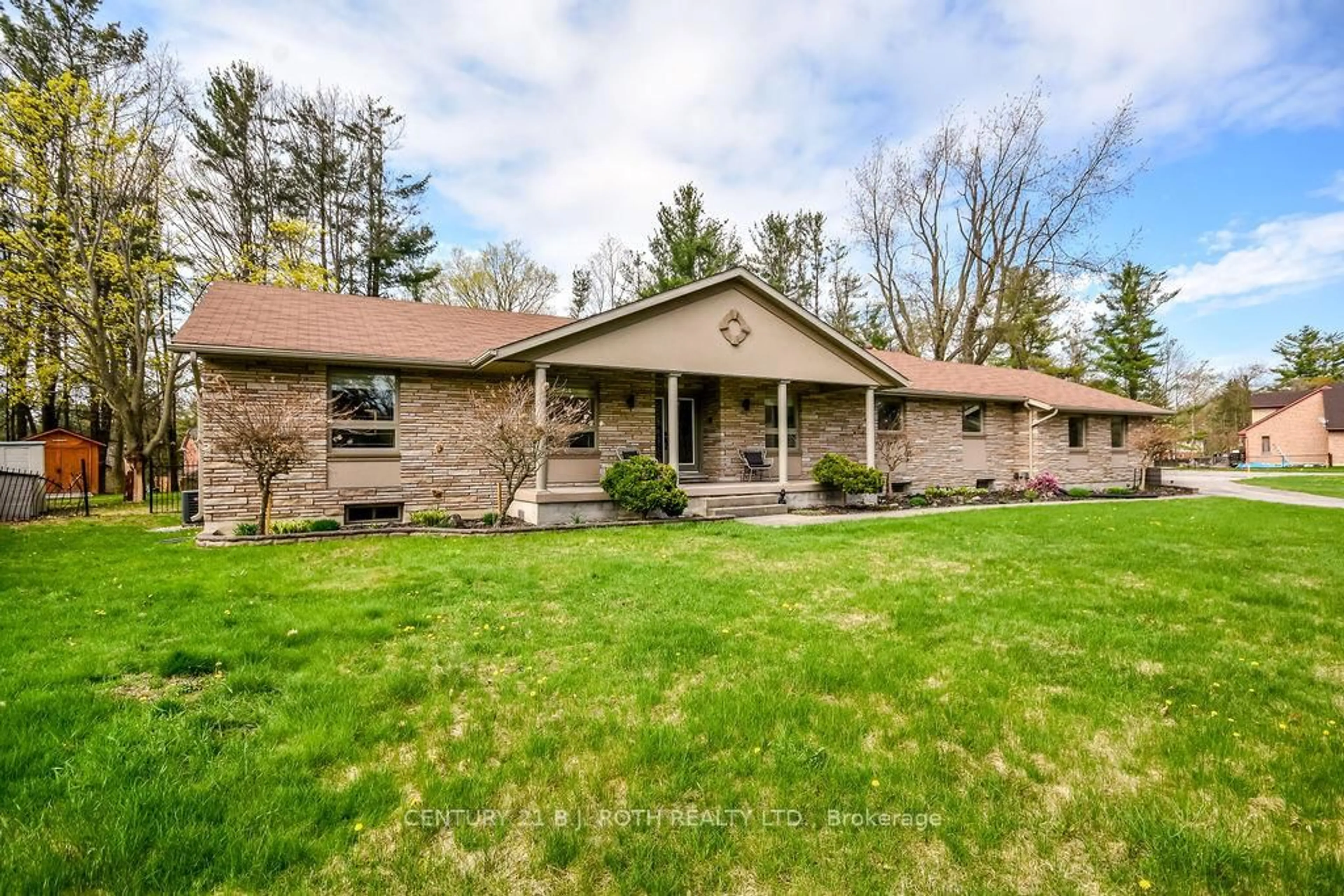 Home with brick exterior material, unknown for 12 Noraline Ave, Springwater Ontario L0L 1X1