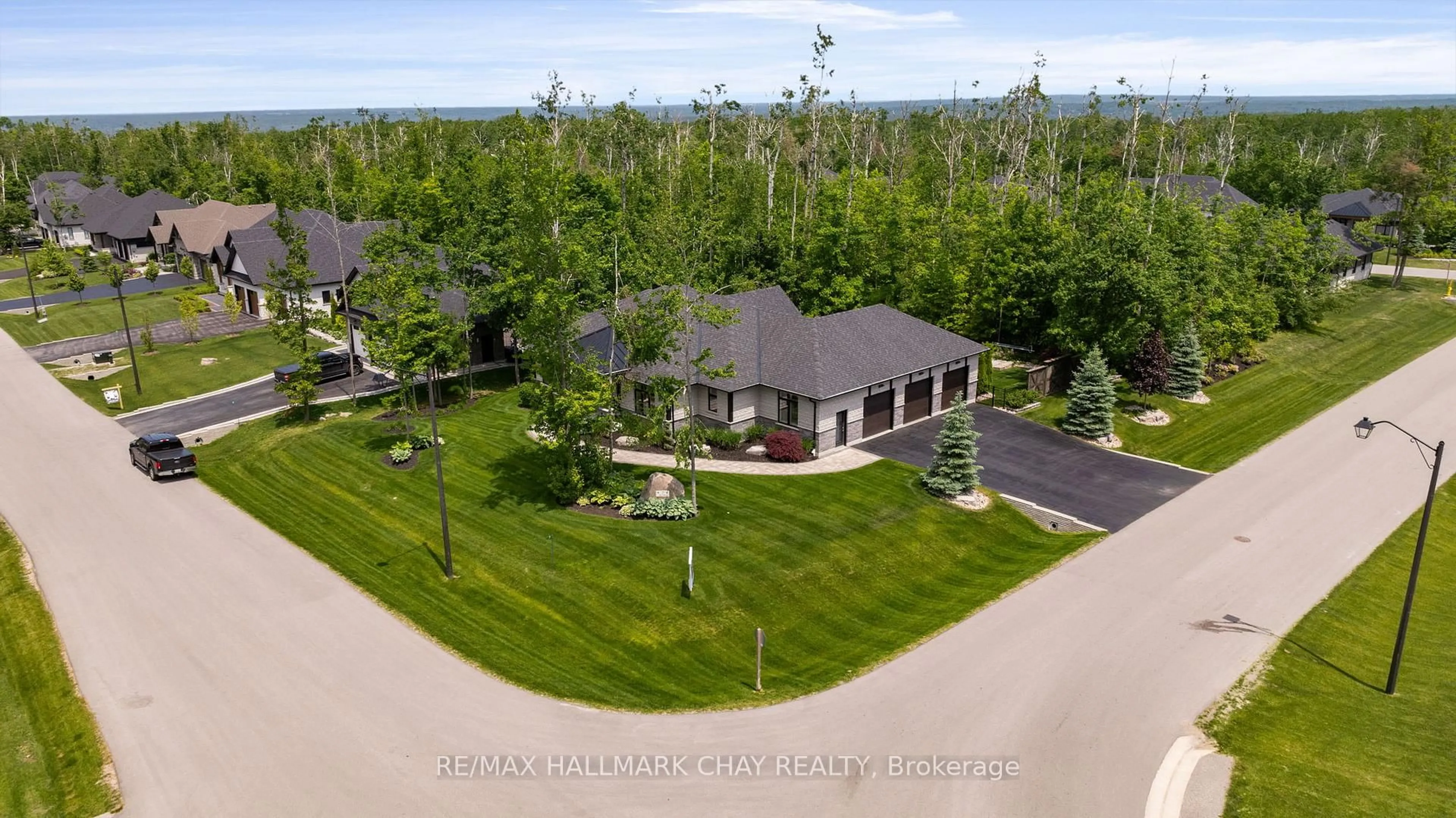 A pic from outside/outdoor area/front of a property/back of a property/a pic from drone, water/lake/river/ocean view for 7 Byers St, Springwater Ontario L9X 2A3