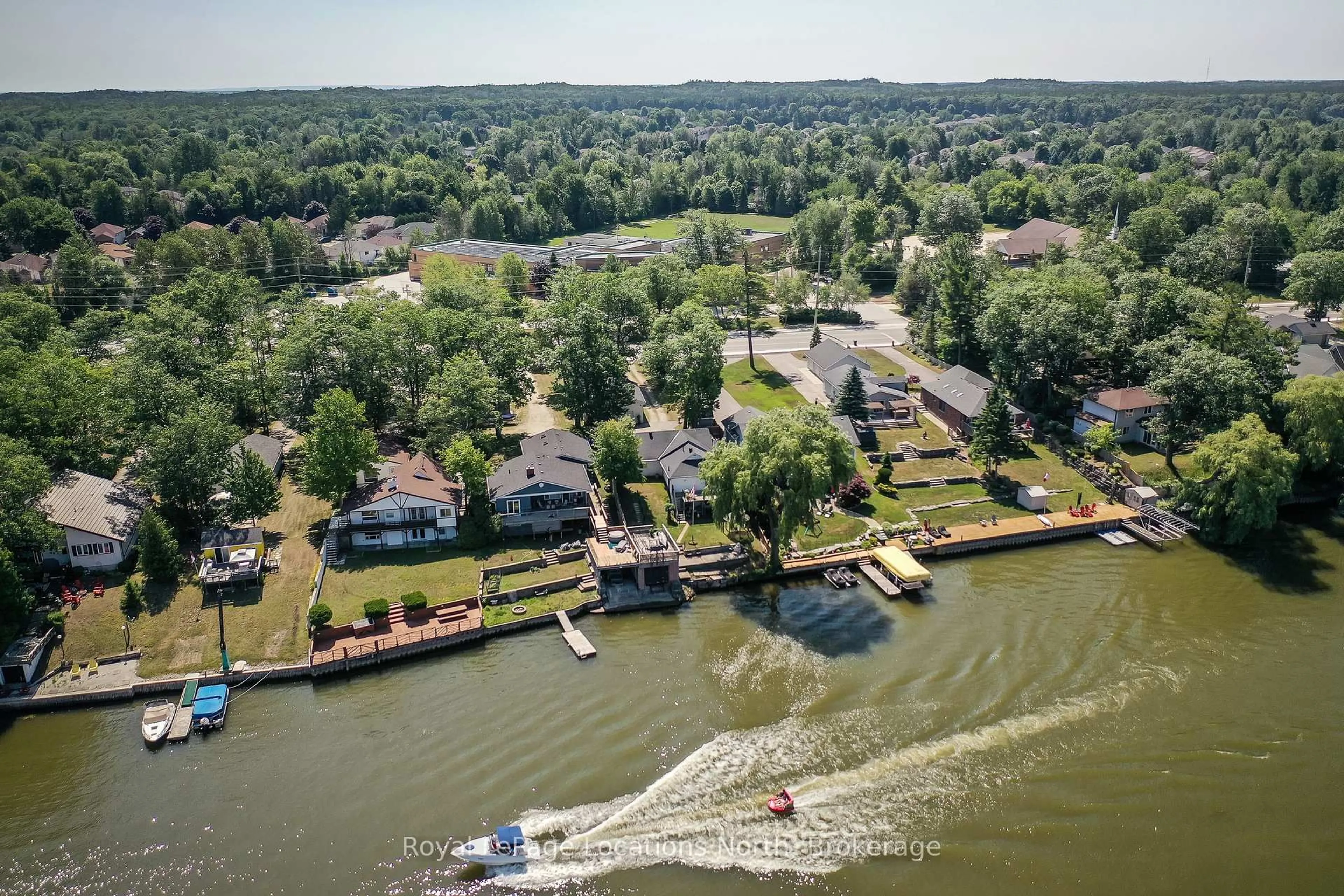 A pic from outside/outdoor area/front of a property/back of a property/a pic from drone, water/lake/river/ocean view for 1320 River Rd, Wasaga Beach Ontario L9Z 2W6