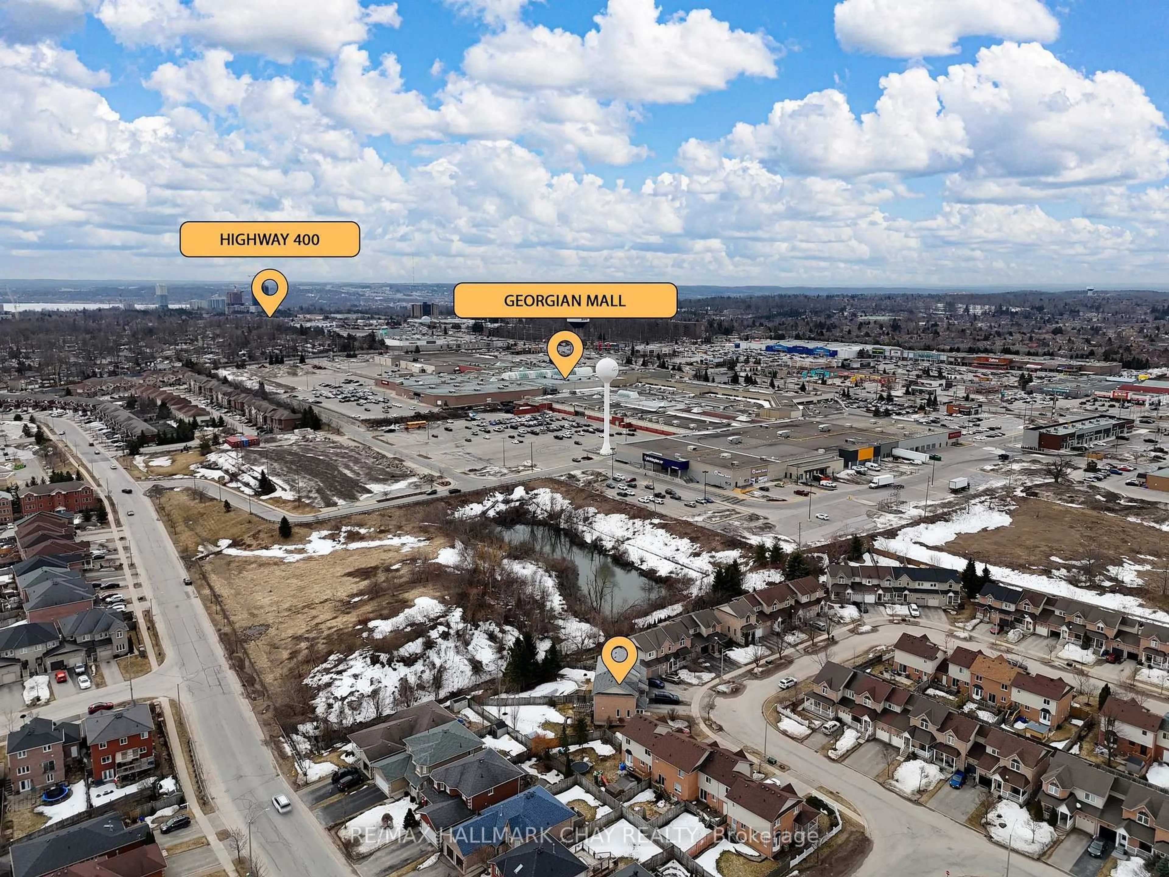 A pic from outside/outdoor area/front of a property/back of a property/a pic from drone, street for 127 Trevino Circ, Barrie Ontario L4M 6T8