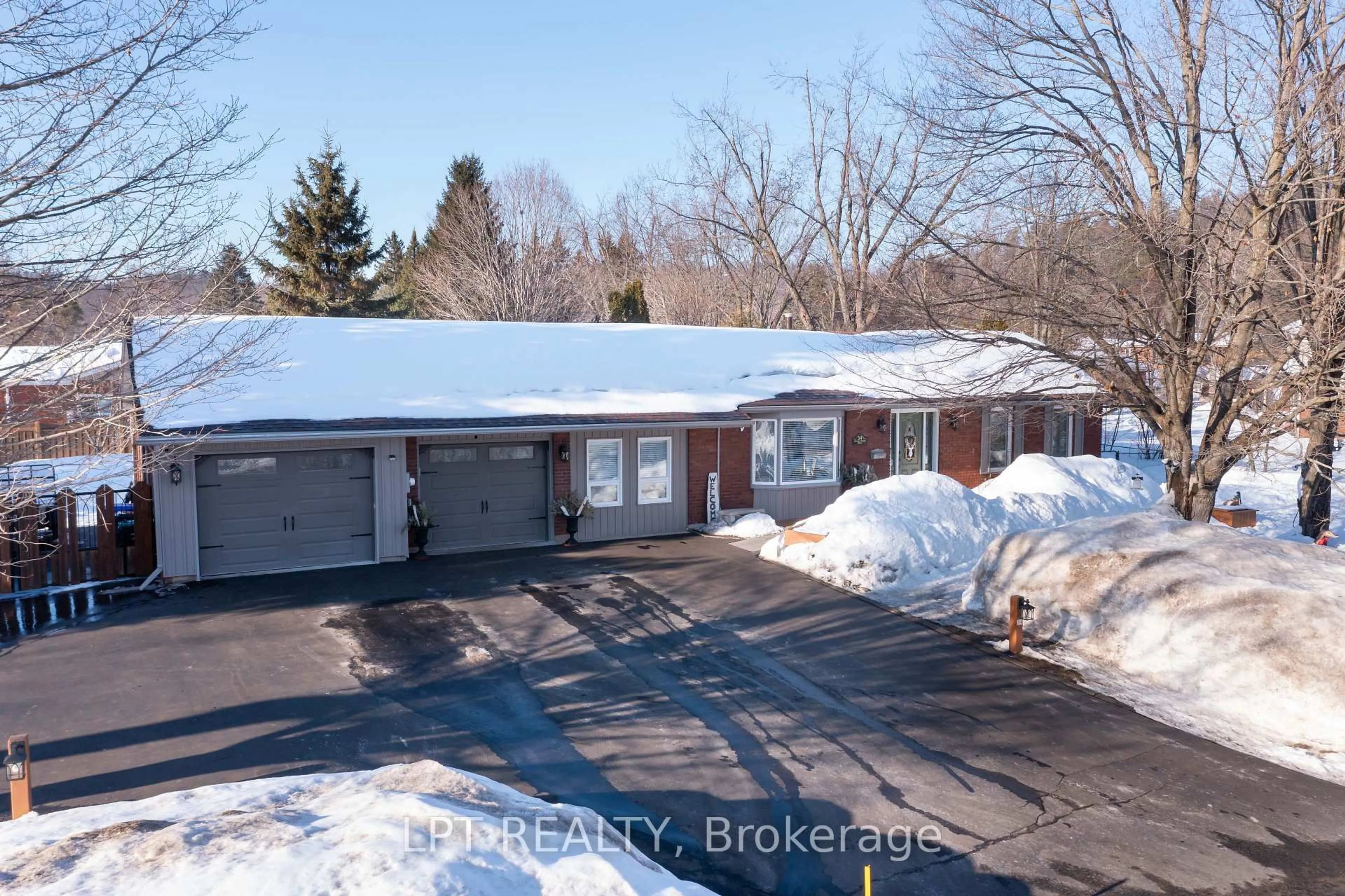 A pic from outside/outdoor area/front of a property/back of a property/a pic from drone, street for 34 Cedar Creek Rd, Springwater Ontario L9X 0P5