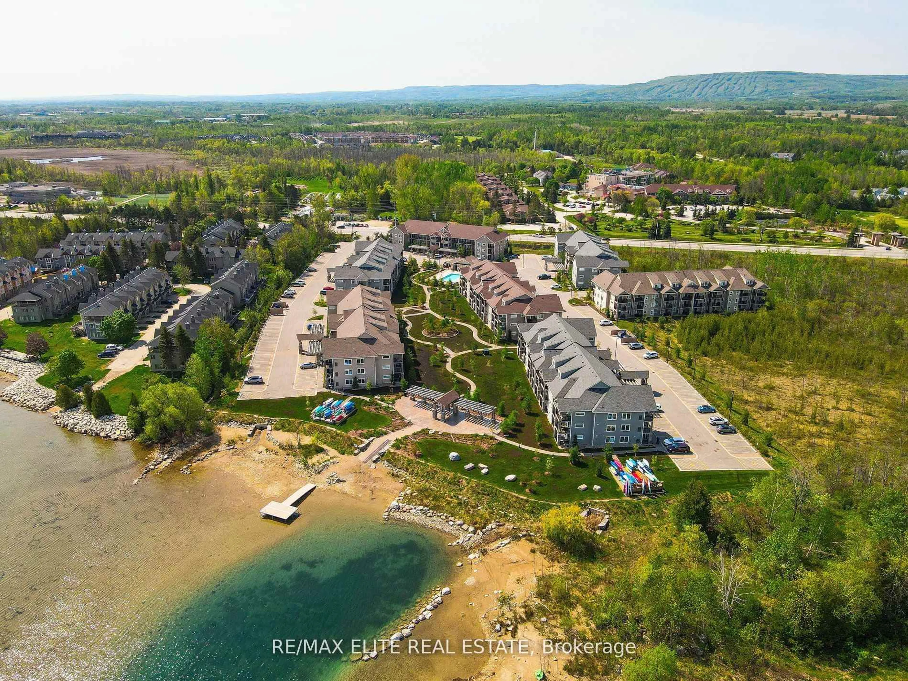 A pic from outside/outdoor area/front of a property/back of a property/a pic from drone, water/lake/river/ocean view for 5 Anchorage Cres #303, Collingwood Ontario L9Y 0Y6