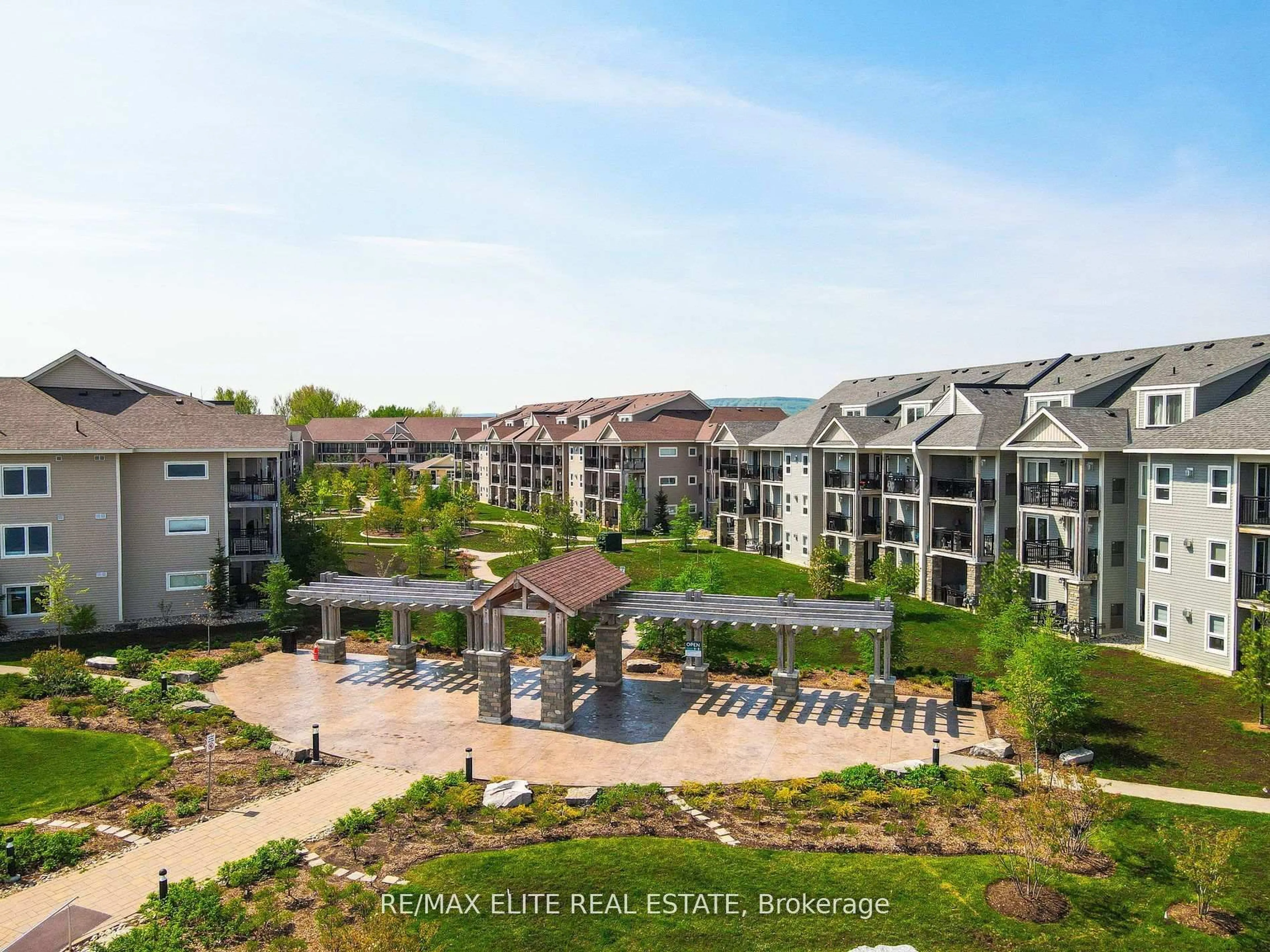 A pic from outside/outdoor area/front of a property/back of a property/a pic from drone, unknown for 5 Anchorage Cres #303, Collingwood Ontario L9Y 0Y6