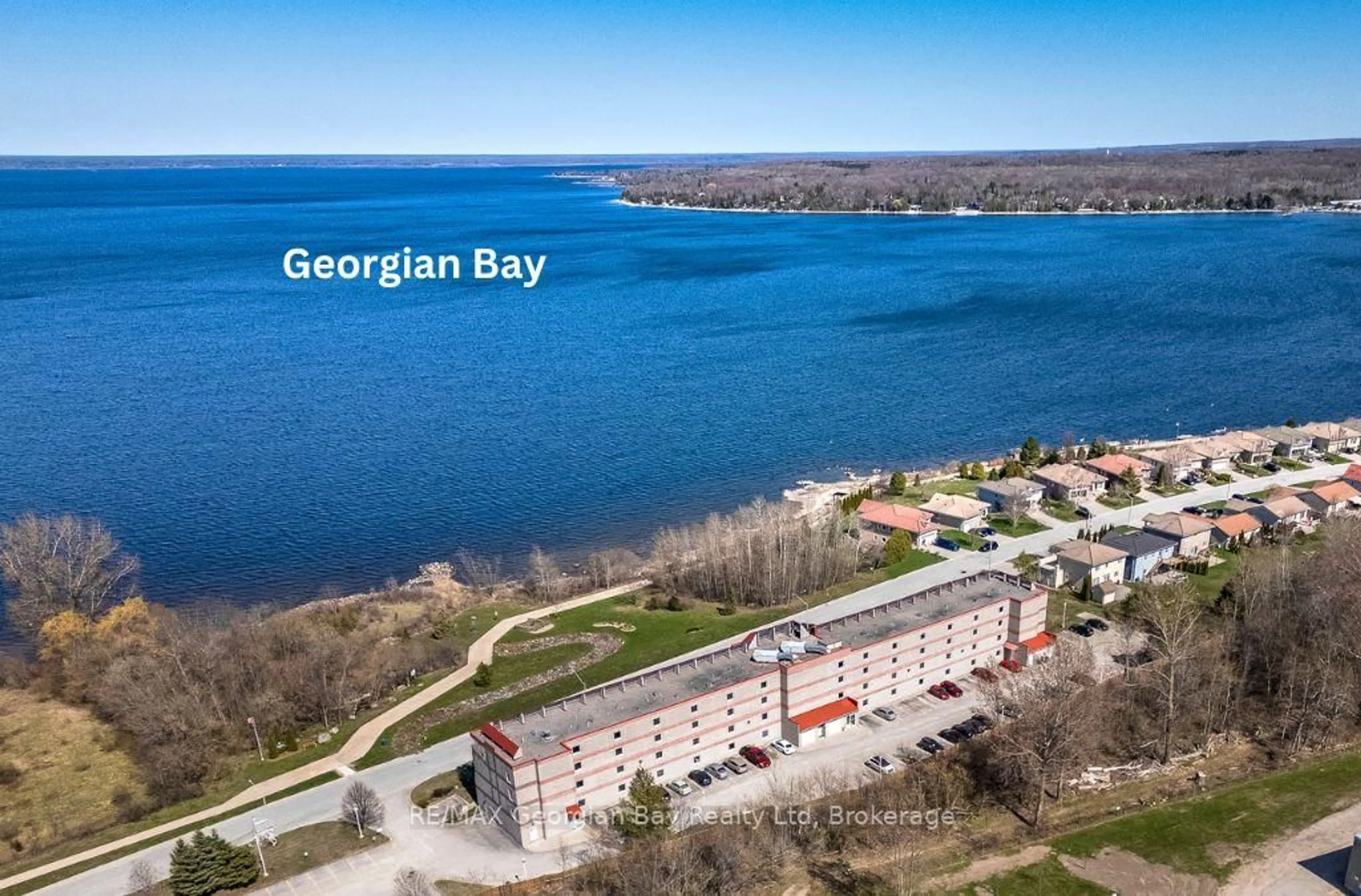 A pic from outside/outdoor area/front of a property/back of a property/a pic from drone, water/lake/river/ocean view for 280 Aberdeen Blvd #415, Midland Ontario L4R 5N4