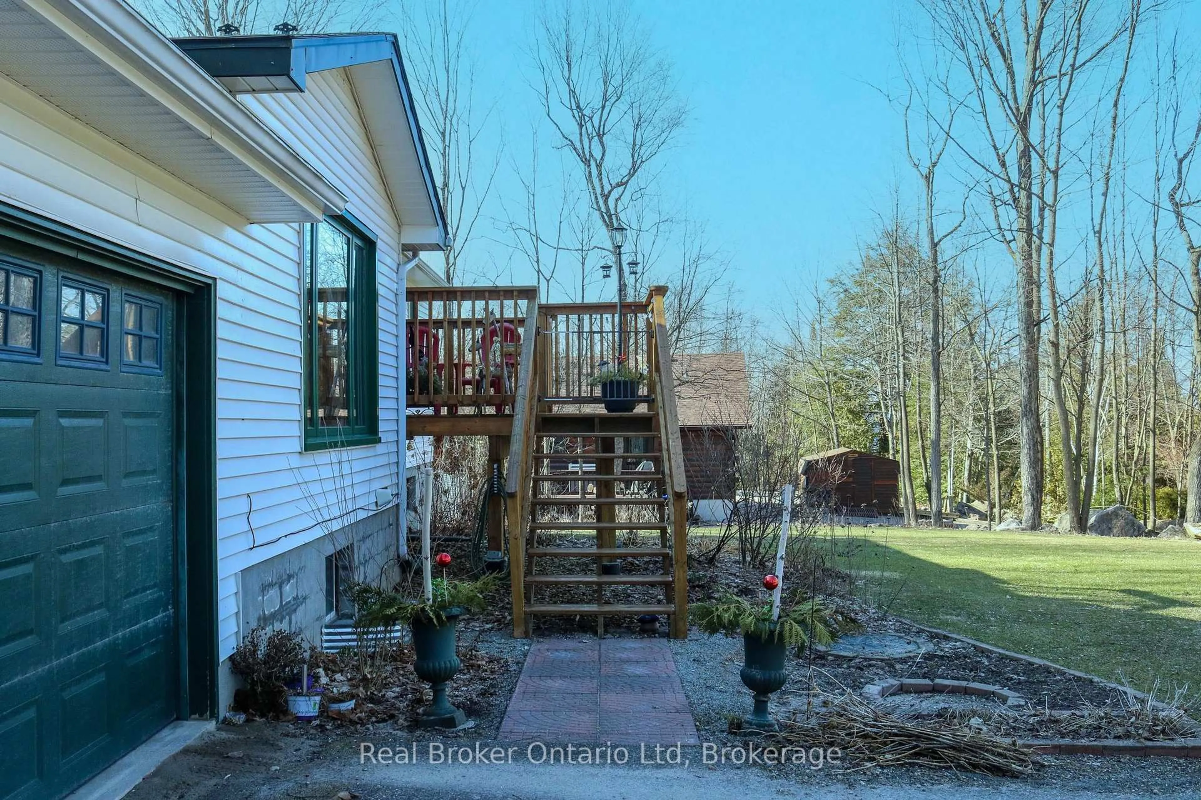 A pic from outside/outdoor area/front of a property/back of a property/a pic from drone, forest/trees view for 14 Seneca Cres, Tiny Ontario L9M 0C9