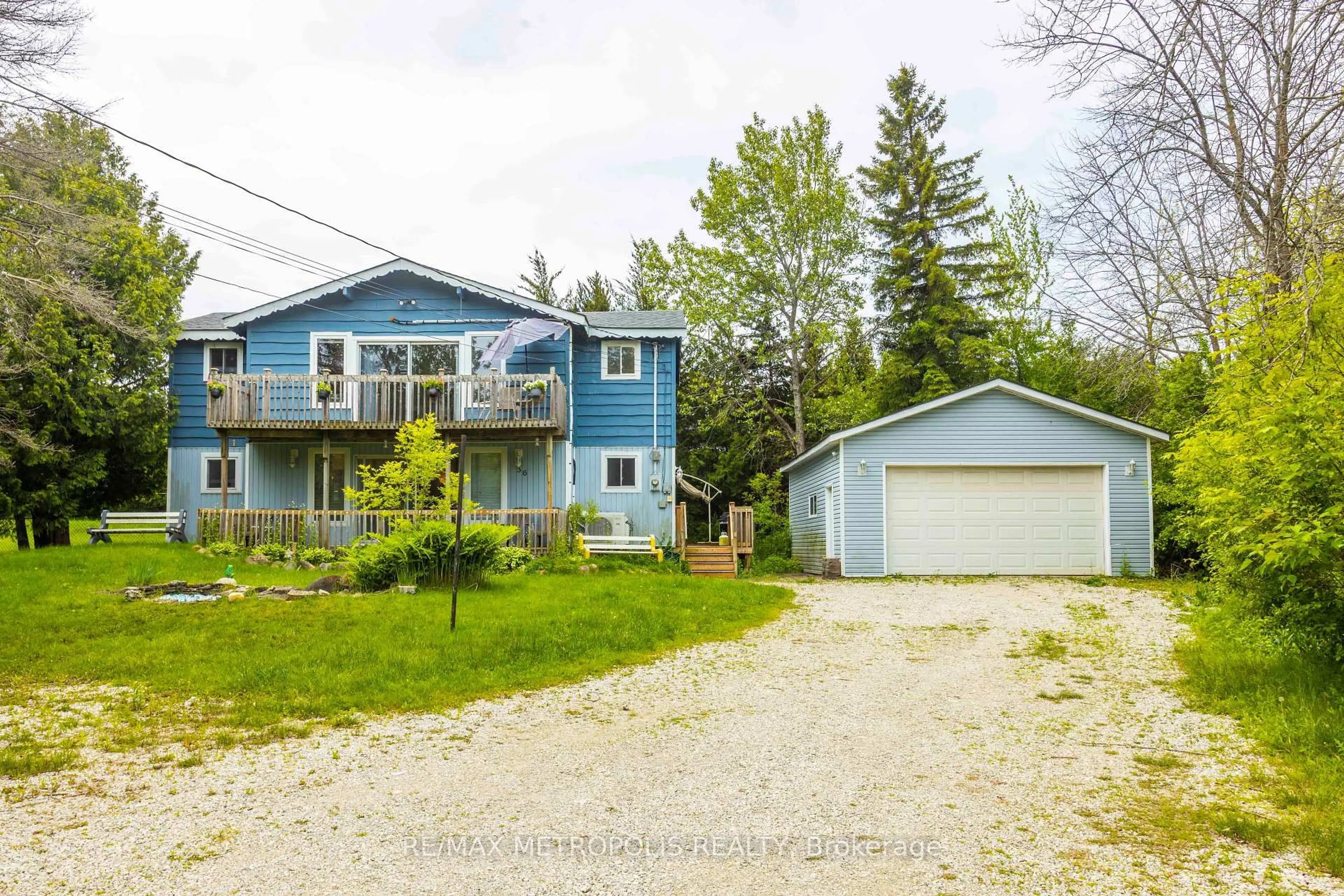 A pic from outside/outdoor area/front of a property/back of a property/a pic from drone, unknown for 56 Georgian Manor Dr, Collingwood Ontario L9Y 3Z1