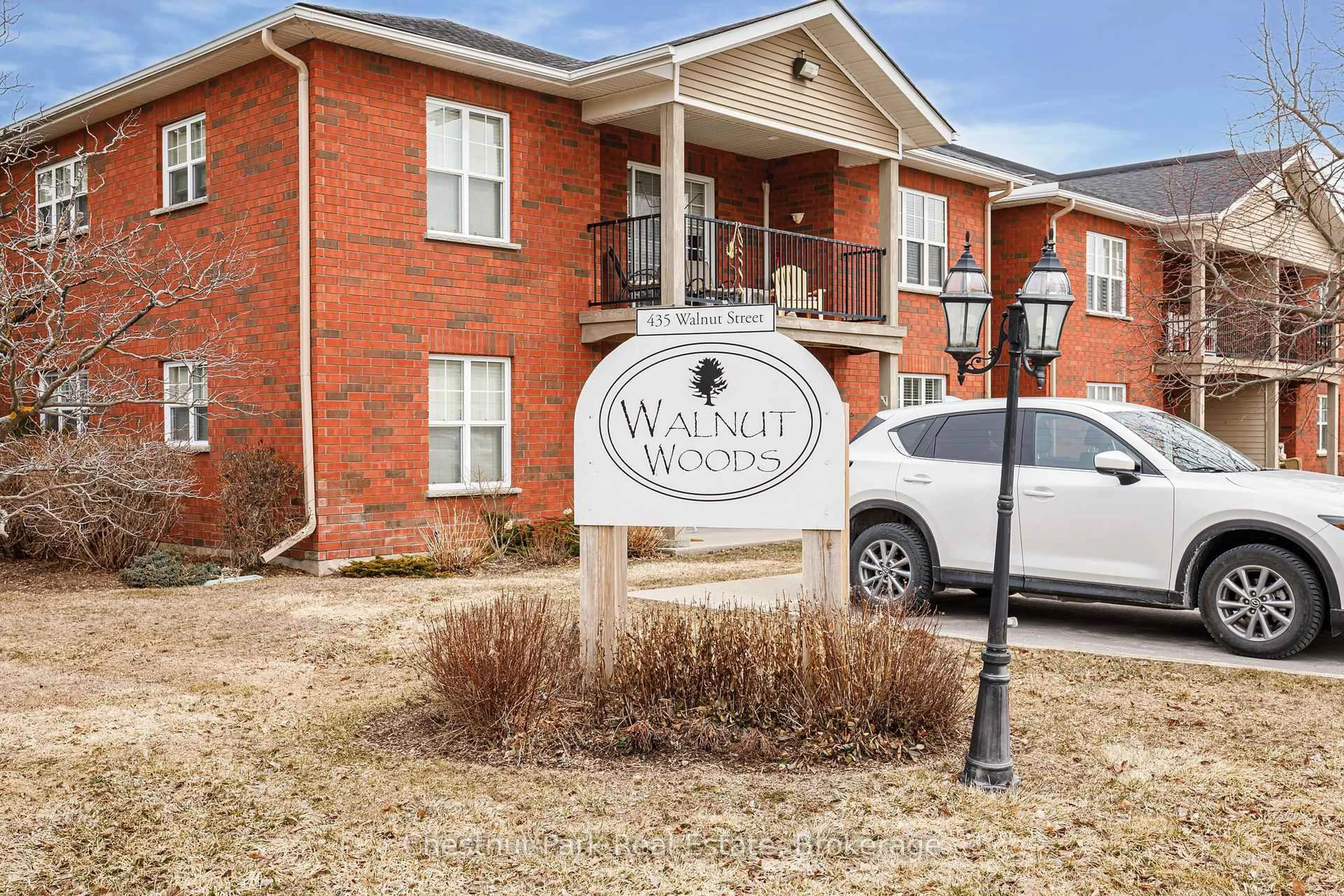 Home with brick exterior material, street for 435 Walnut St #206, Collingwood Ontario L9Y 5J9