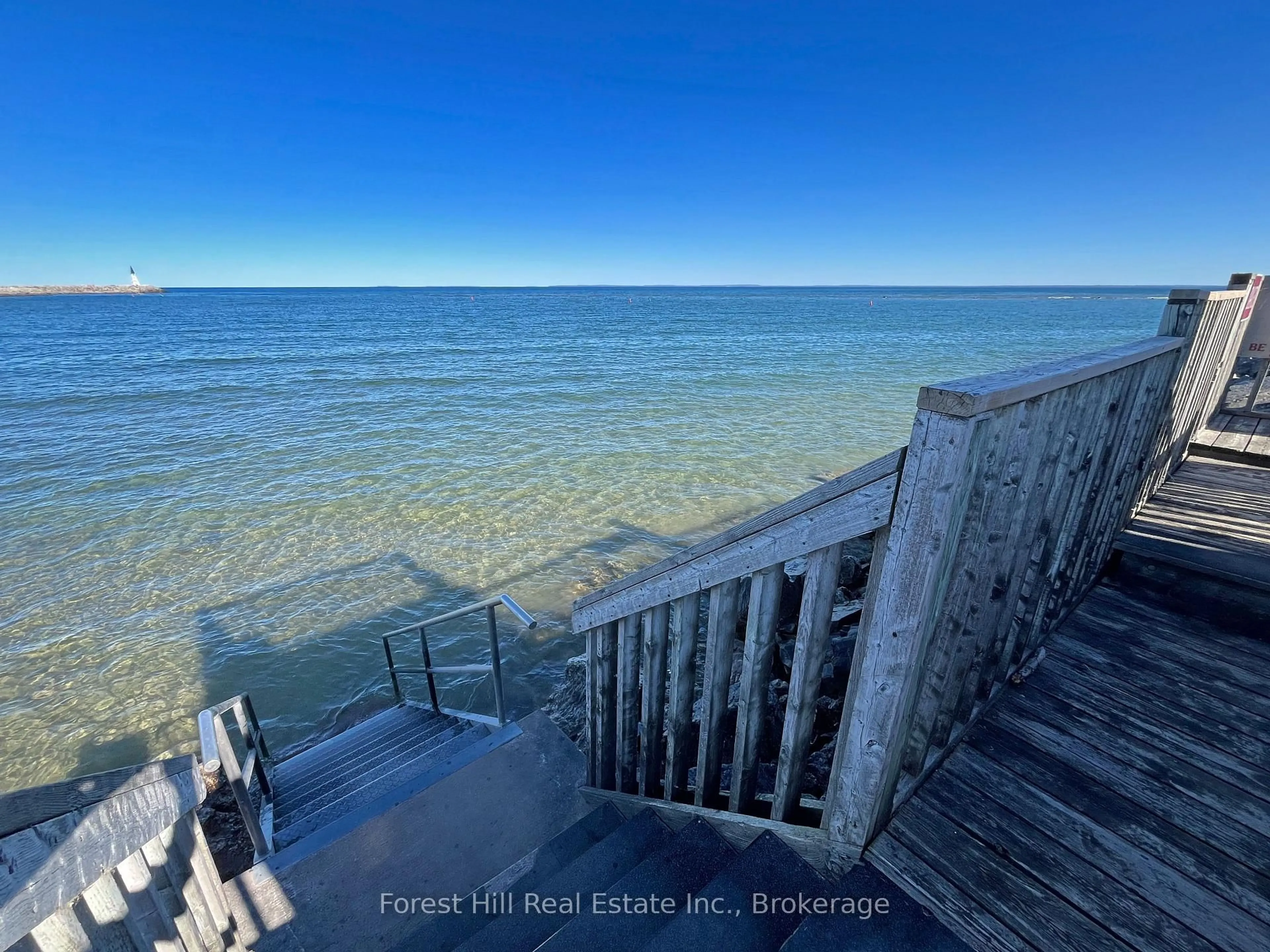 A pic from outside/outdoor area/front of a property/back of a property/a pic from drone, water/lake/river/ocean view for 24 Ramblings Way #402, Collingwood Ontario L9Y 5C6