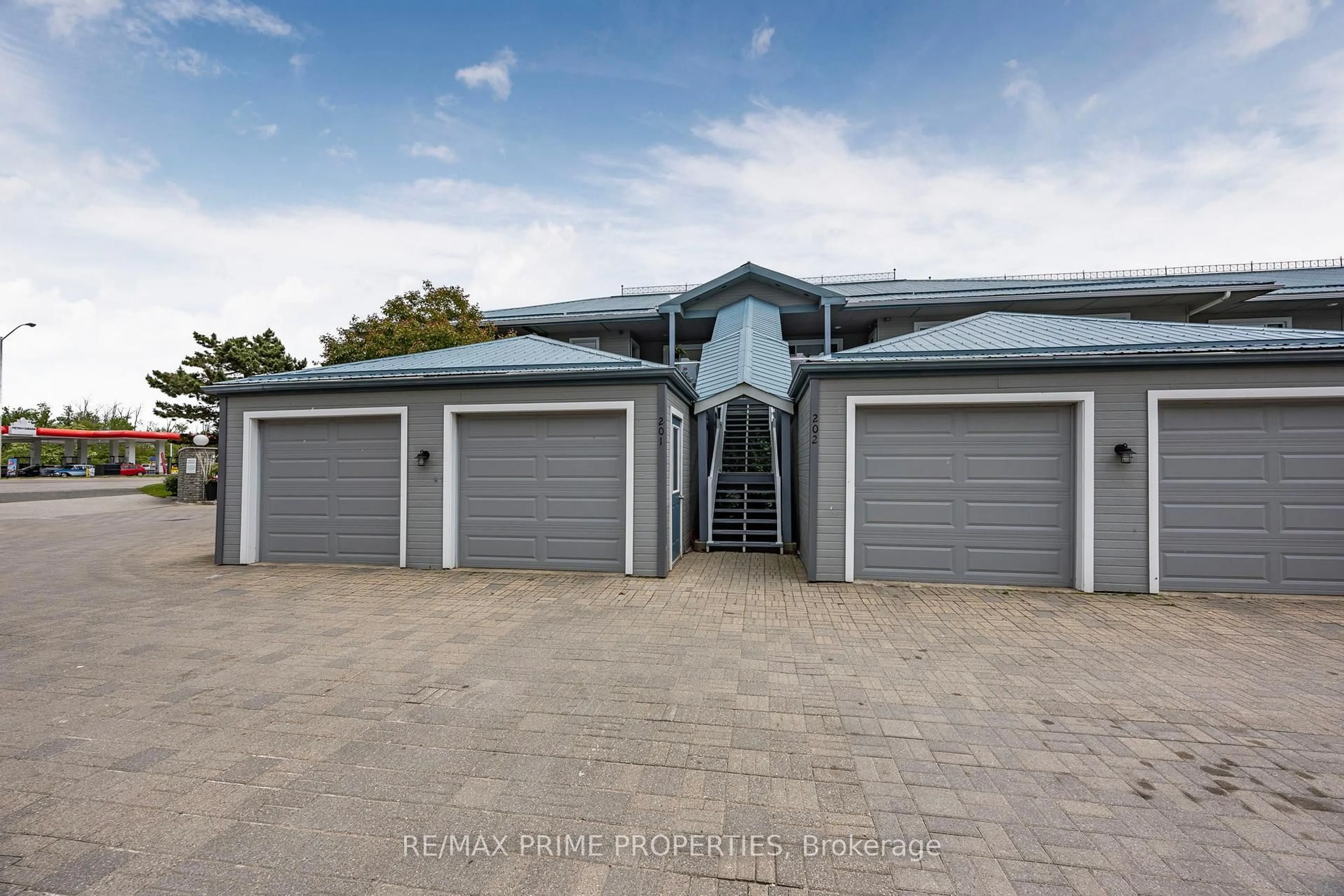 A pic from outside/outdoor area/front of a property/back of a property/a pic from drone, street for 585 Atherley Rd #201, Orillia Ontario L3V 7L5