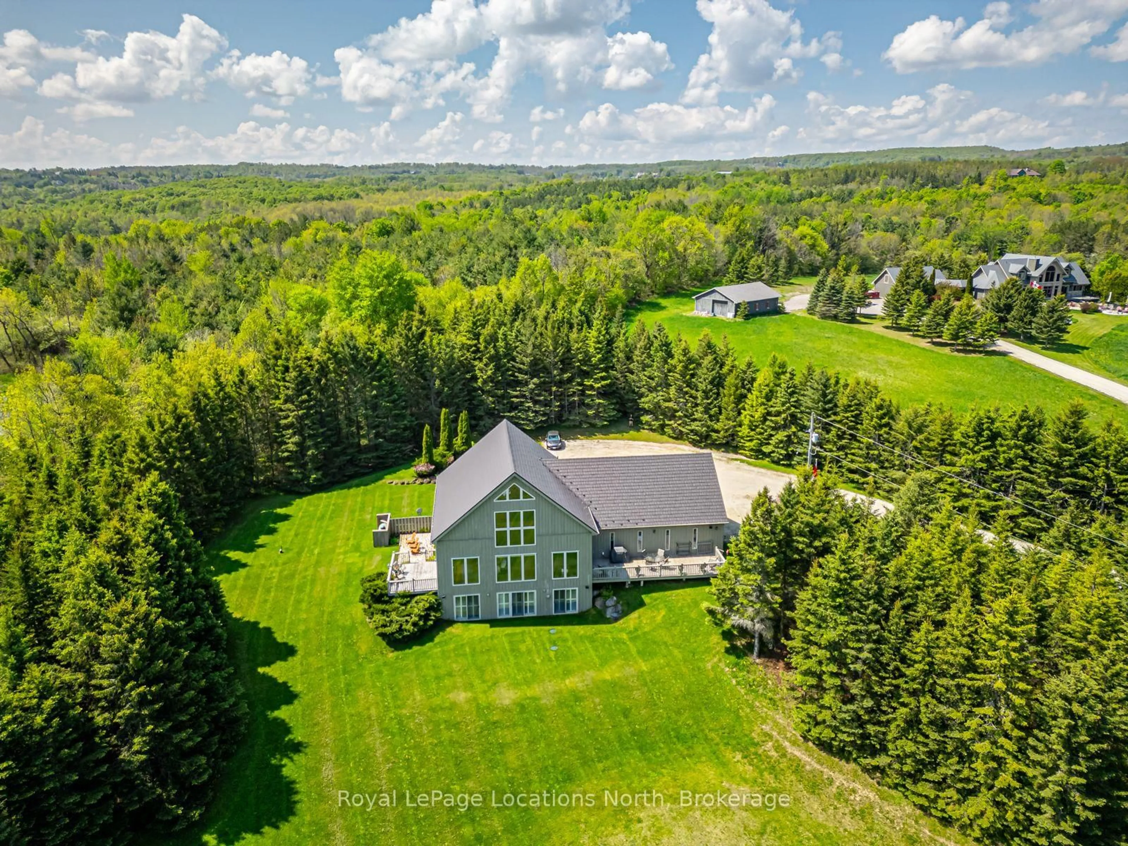 A pic from outside/outdoor area/front of a property/back of a property/a pic from drone, forest/trees view for 9197 County 91 Rd, Clearview Ontario L0M 1H0
