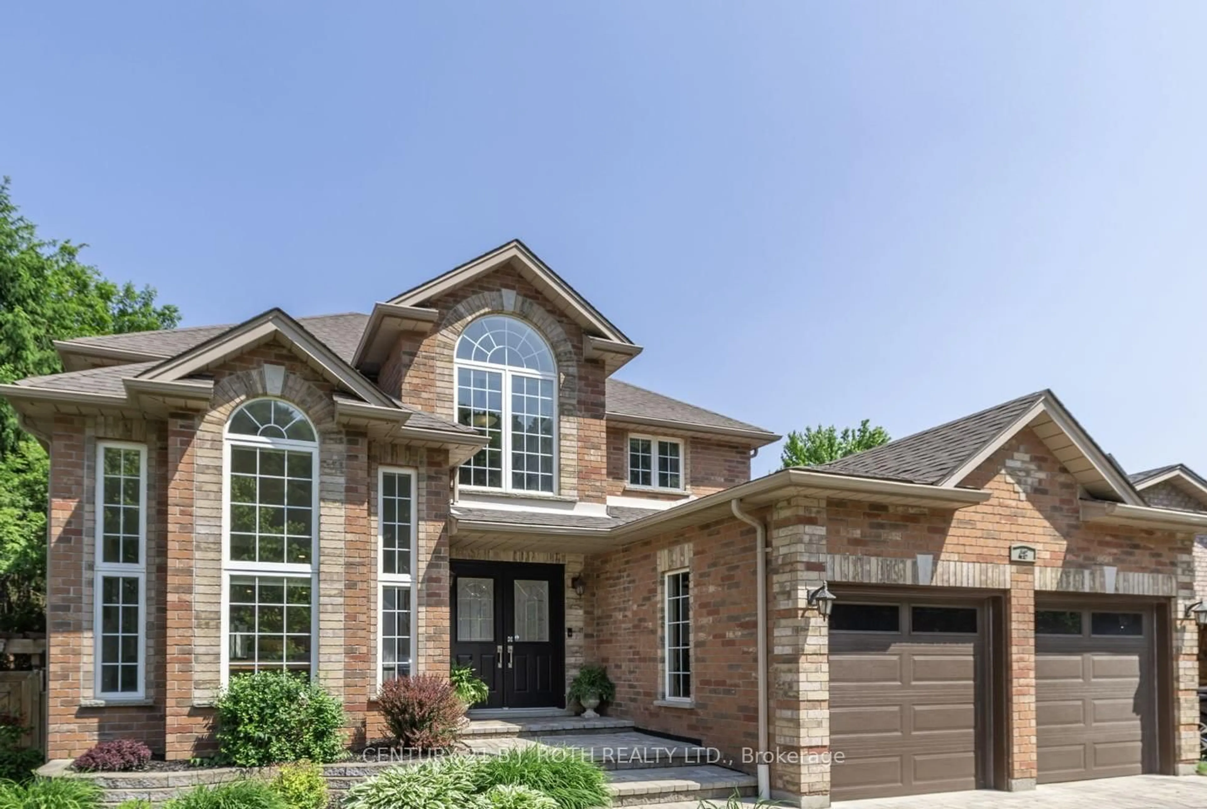 Home with brick exterior material, street for 48 Crimson Ridge Rd, Barrie Ontario L4N 9S1