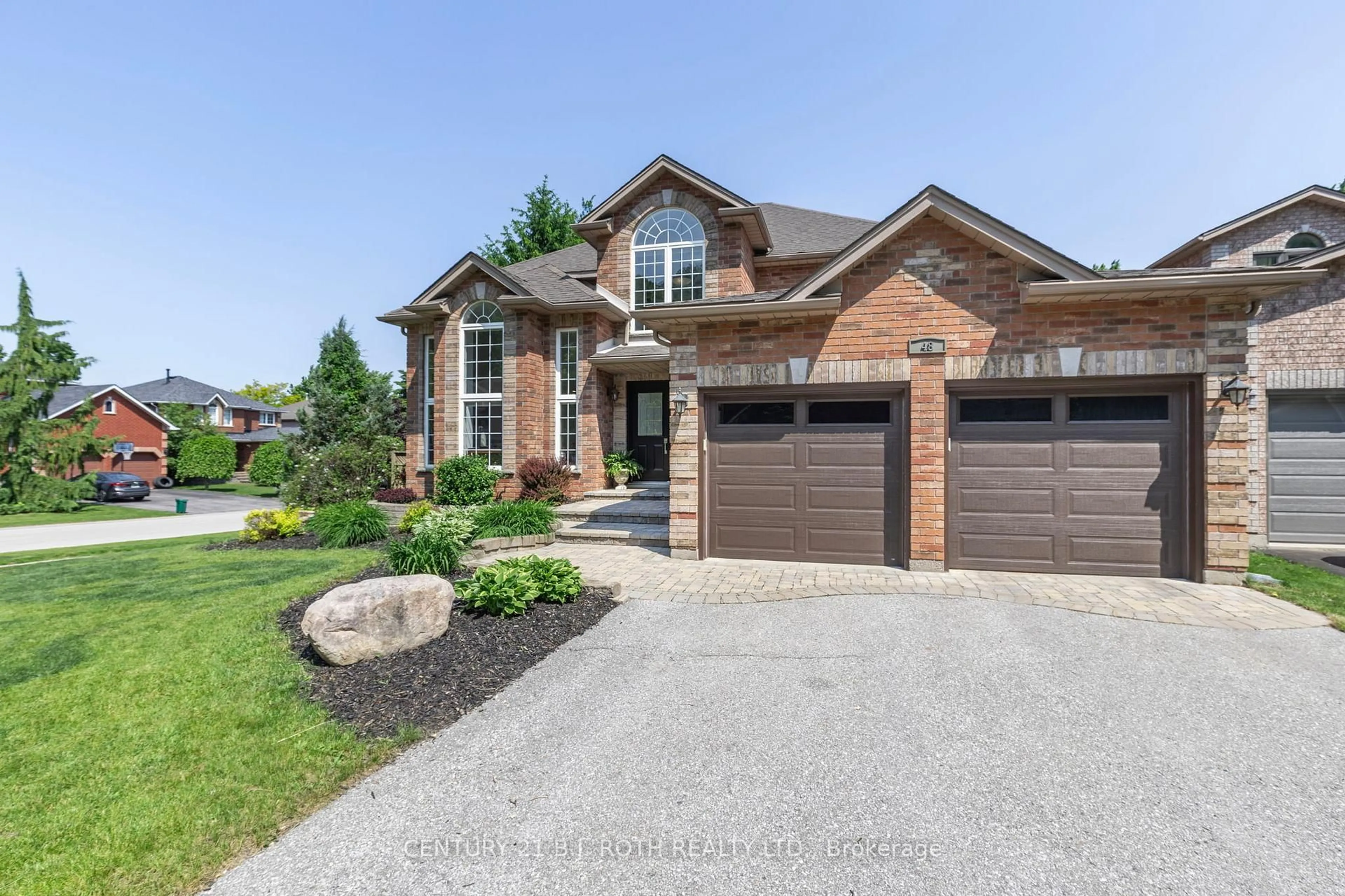 Home with brick exterior material, street for 48 Crimson Ridge Rd, Barrie Ontario L4N 9S1