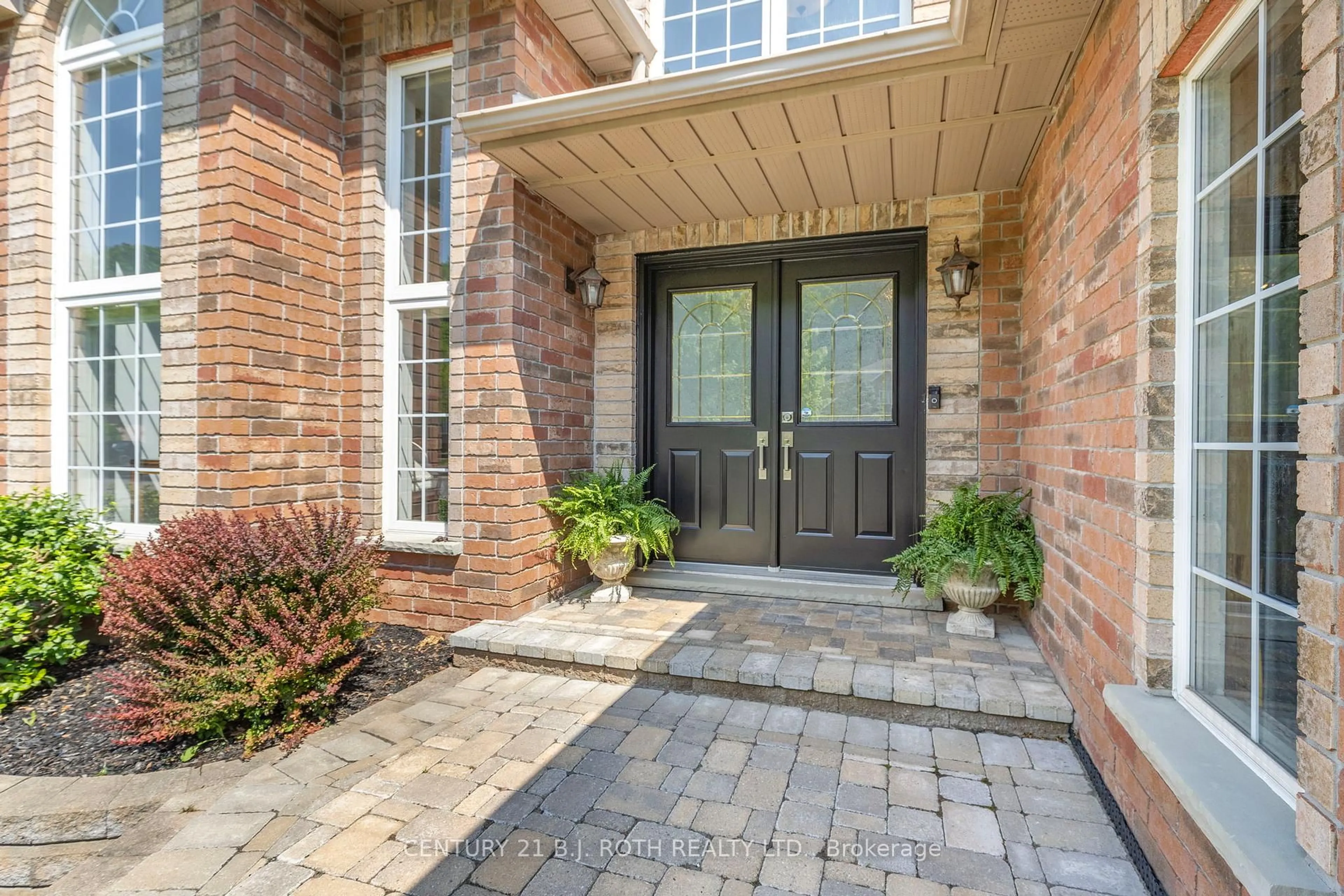 Home with brick exterior material, street for 48 Crimson Ridge Rd, Barrie Ontario L4N 9S1
