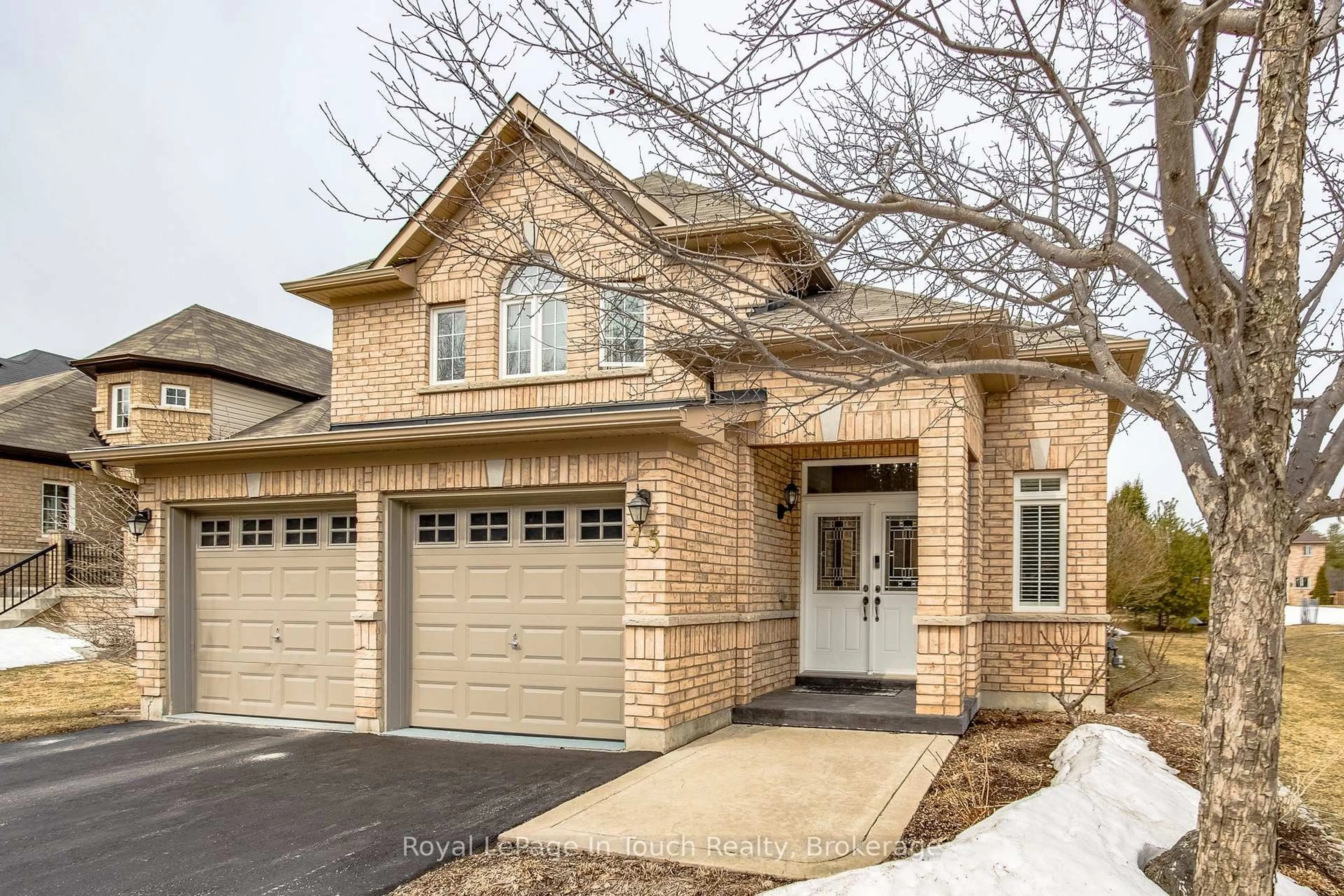 Home with brick exterior material, street for 75 Pearl St, Wasaga Beach Ontario L9Z 0G8