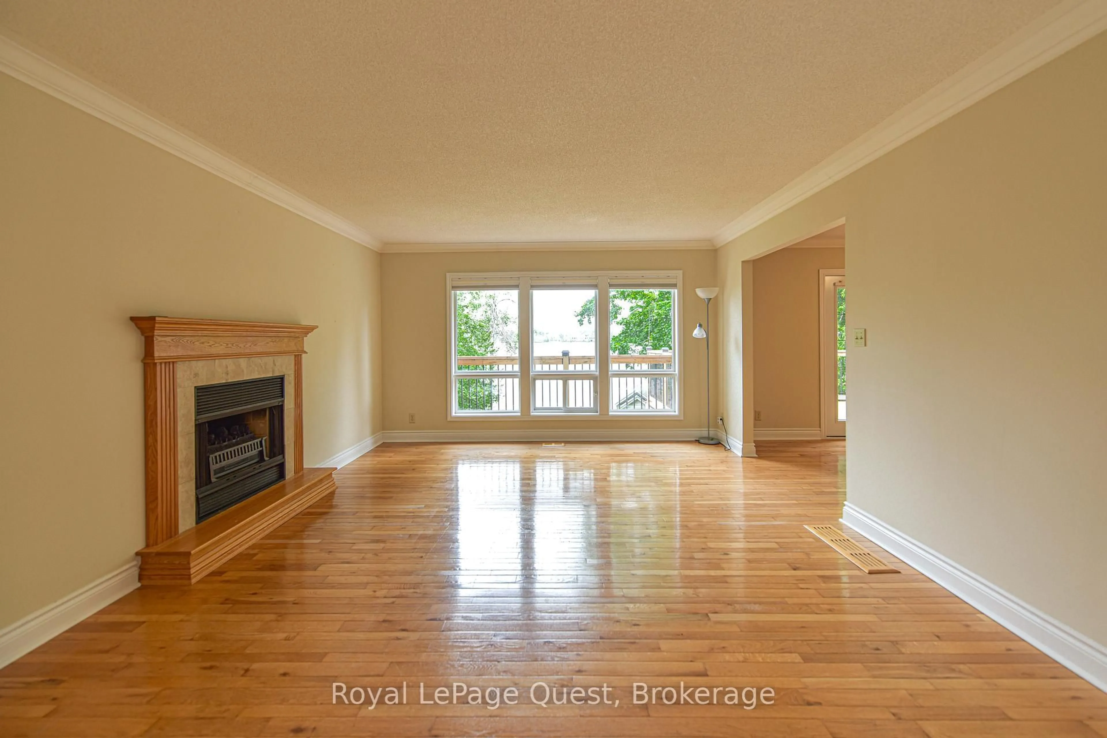 Living room with furniture, wood/laminate floor for 27 Heyden Ave, Orillia Ontario L3V 0G5
