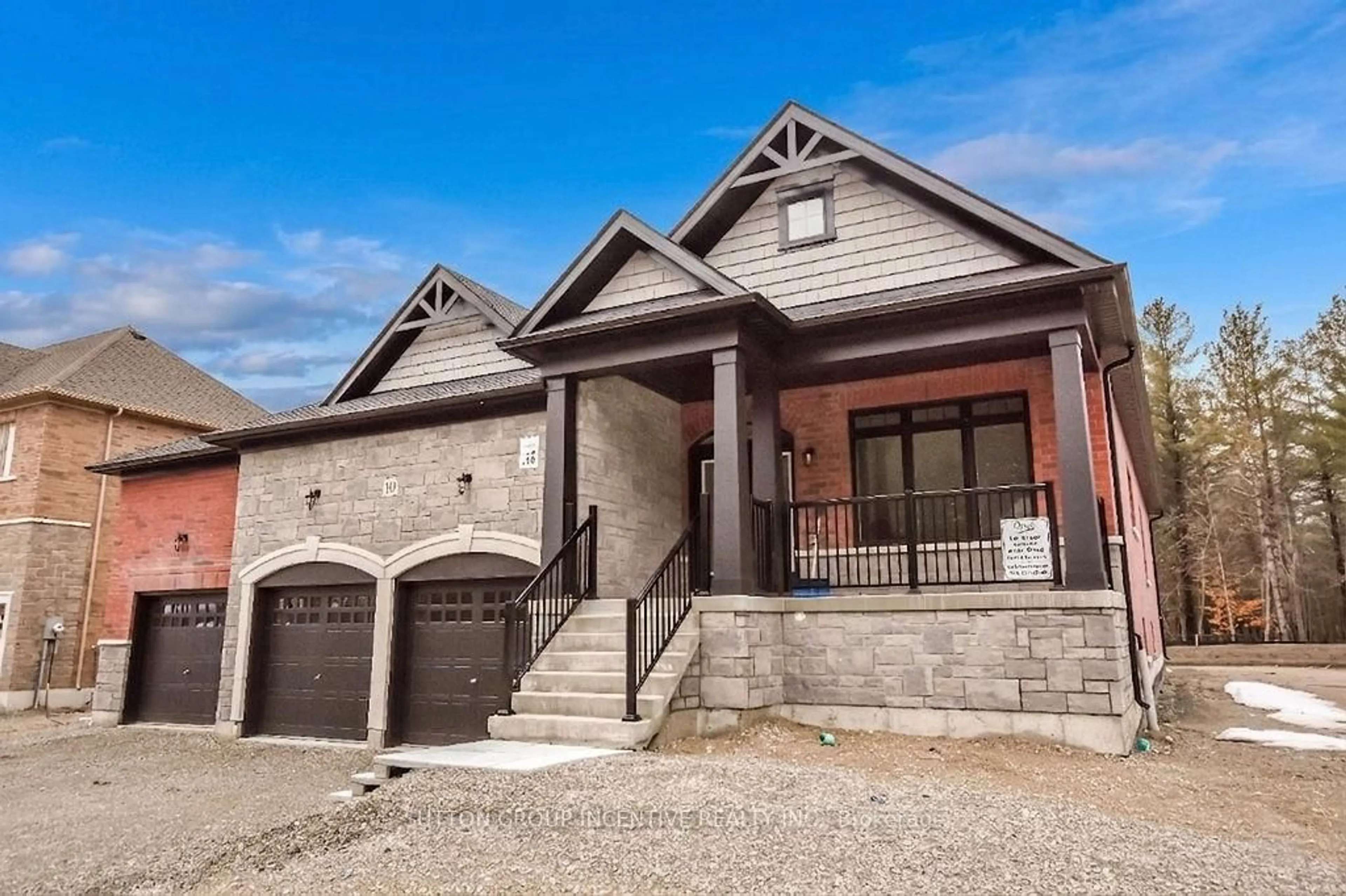 Home with brick exterior material, street for 10 Cottonwood St, Springwater Ontario L0L 1Y2