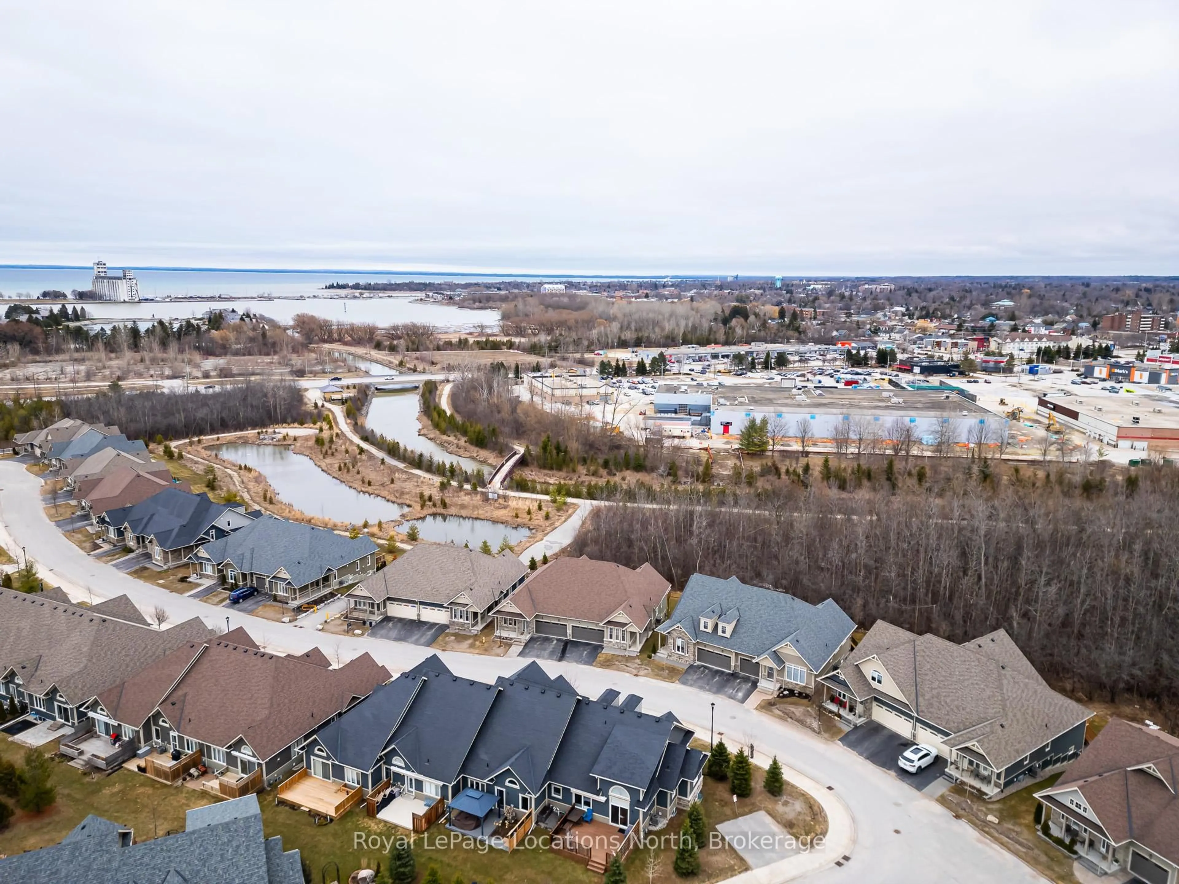 A pic from outside/outdoor area/front of a property/back of a property/a pic from drone, water/lake/river/ocean view for 68 Kari Cres, Collingwood Ontario L9Y 0Z7
