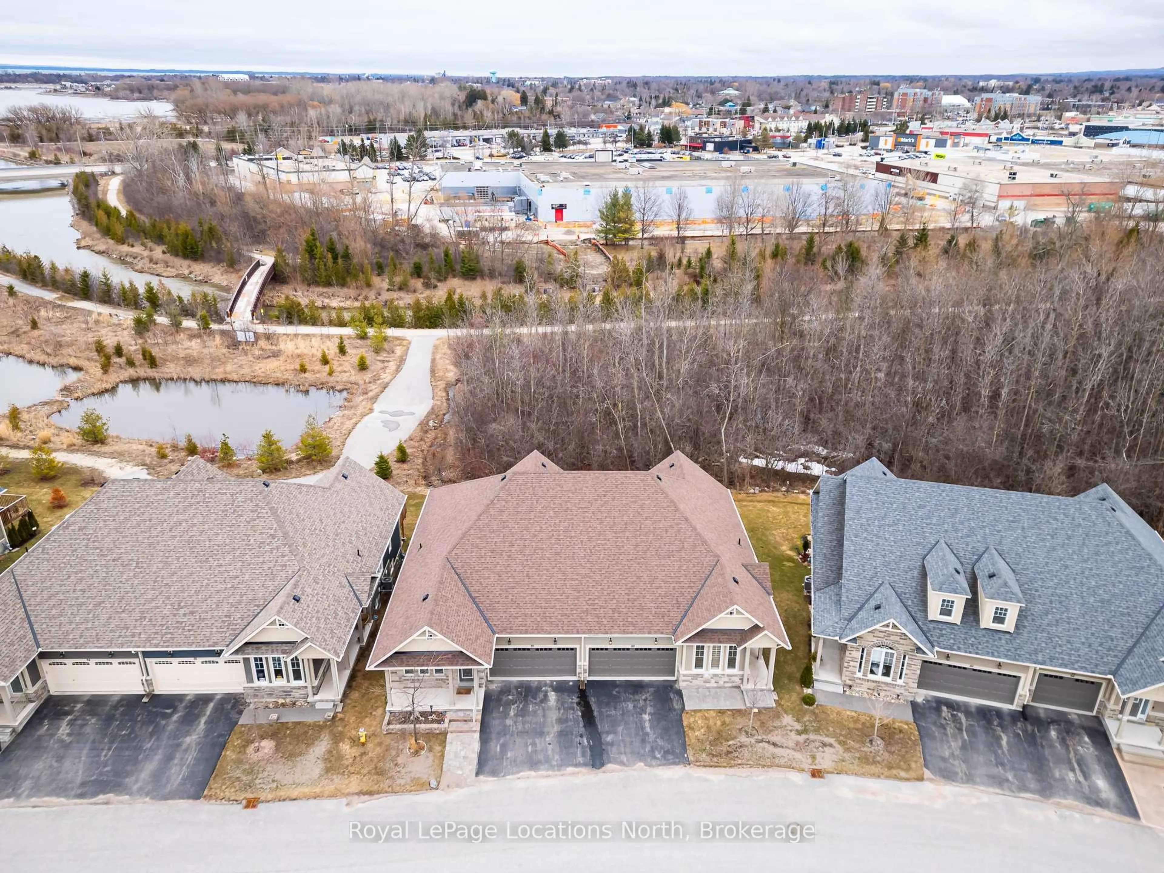 A pic from outside/outdoor area/front of a property/back of a property/a pic from drone, unknown for 68 Kari Cres, Collingwood Ontario L9Y 0Z7