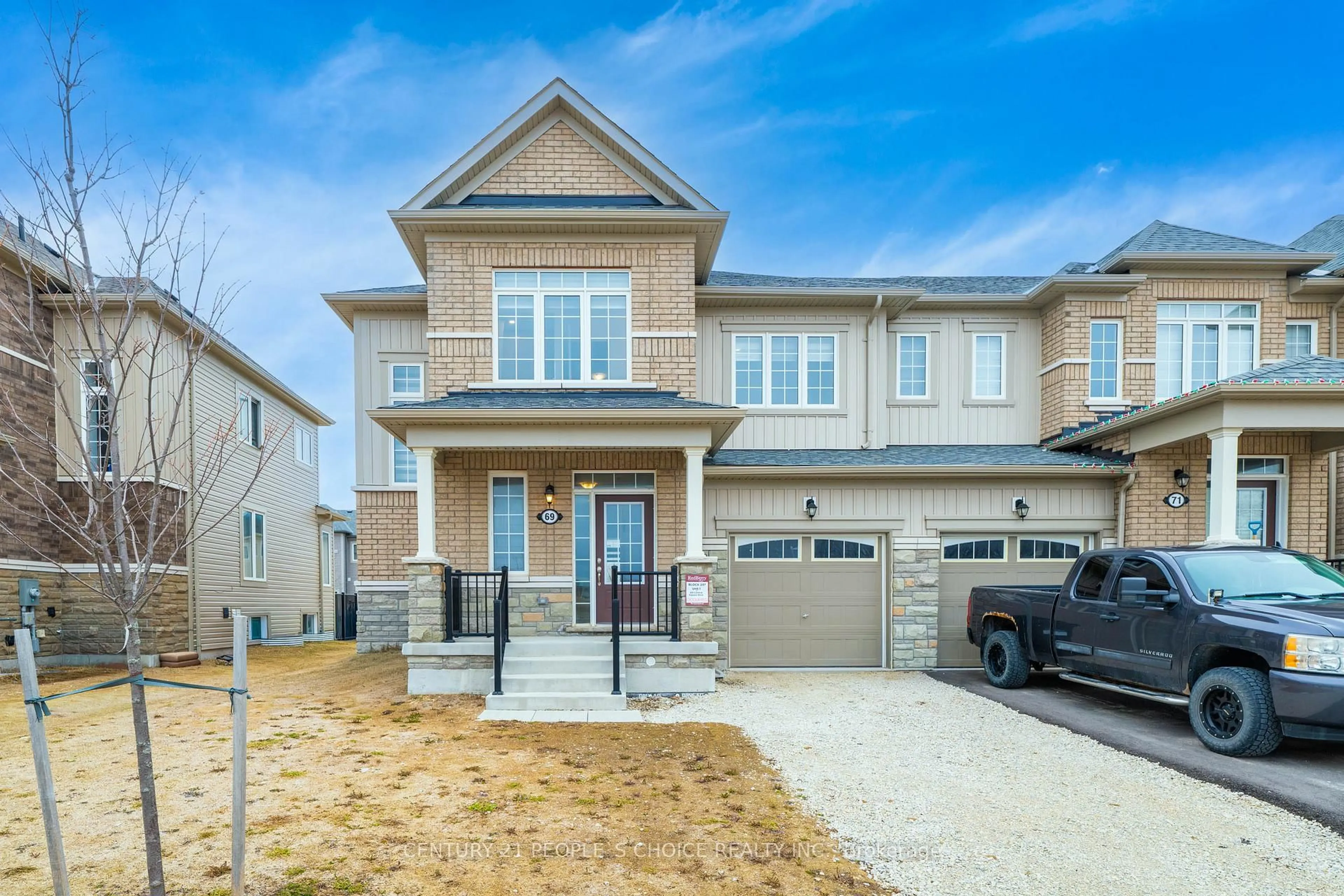 Home with brick exterior material, street for 69 Central Square Blvd, Wasaga Beach Ontario L9Z 0L9