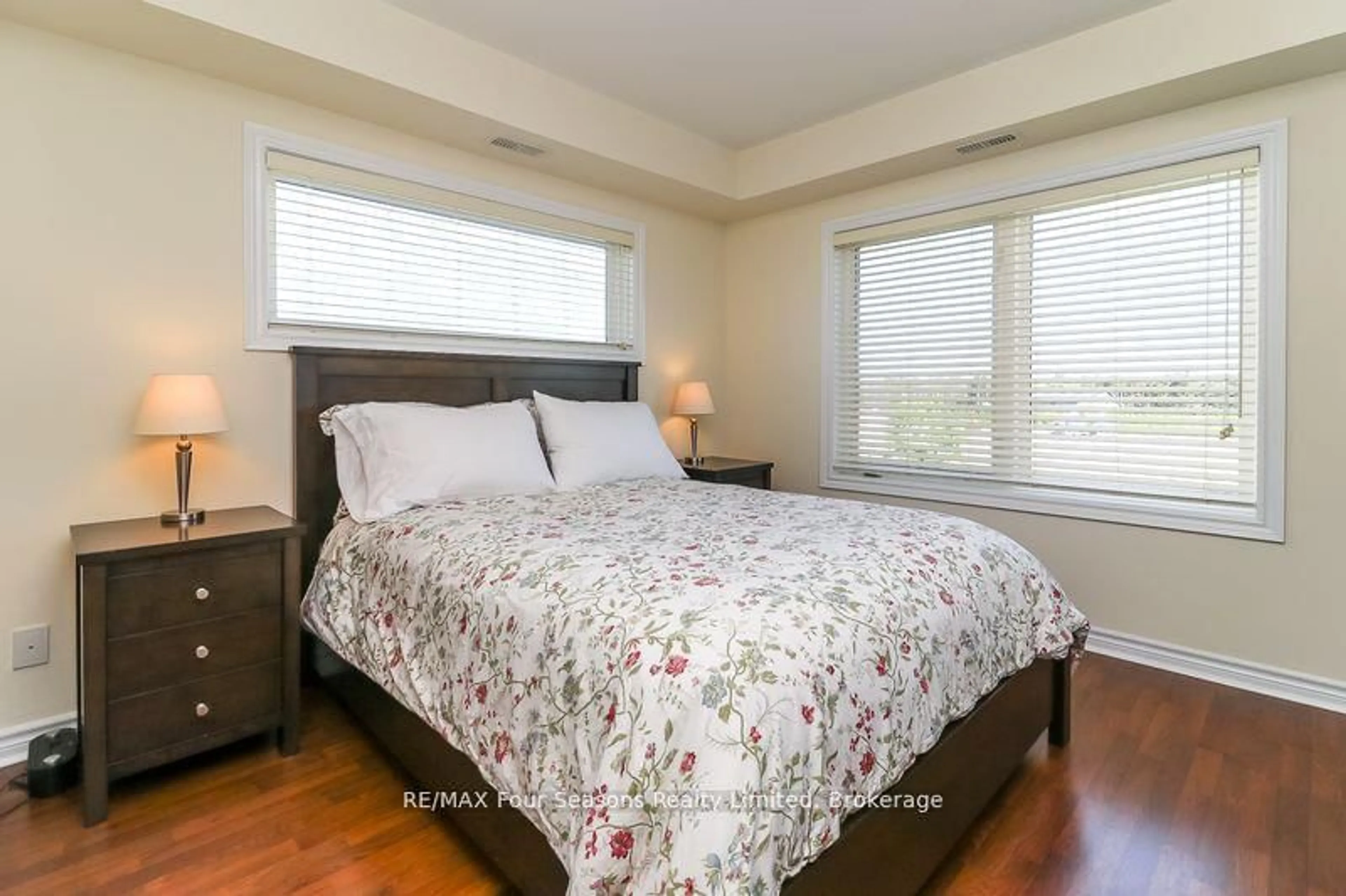 Bedroom with bed, wood/laminate floor for 6 Brandy Lane Dr #308, Collingwood Ontario L9Y 0X4
