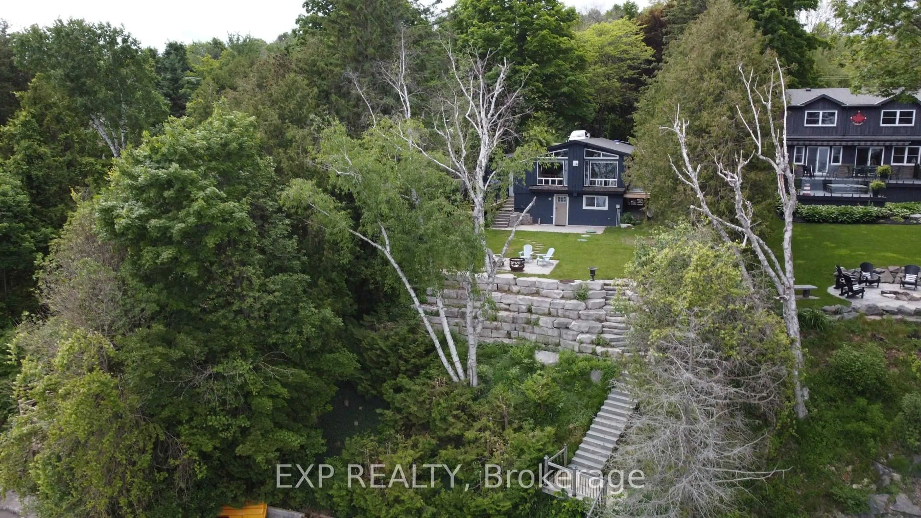 A pic from outside/outdoor area/front of a property/back of a property/a pic from drone, forest/trees view for 2295 Lakeshore Rd, Oro-Medonte Ontario L0L 1T0