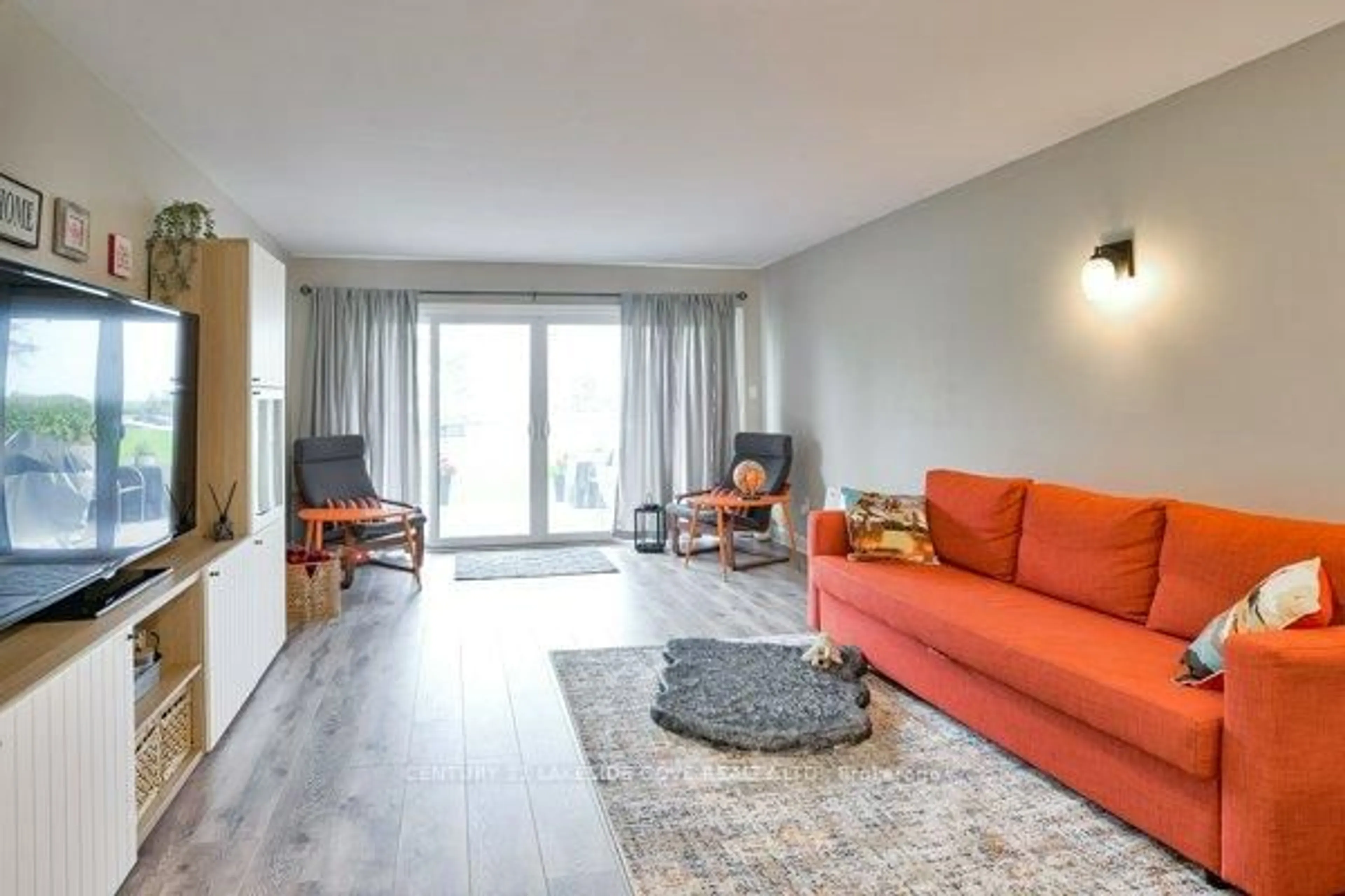 Living room with furniture, unknown for 1 Paradise Blvd #Unit 14, Ramara Ontario L0K 1B0