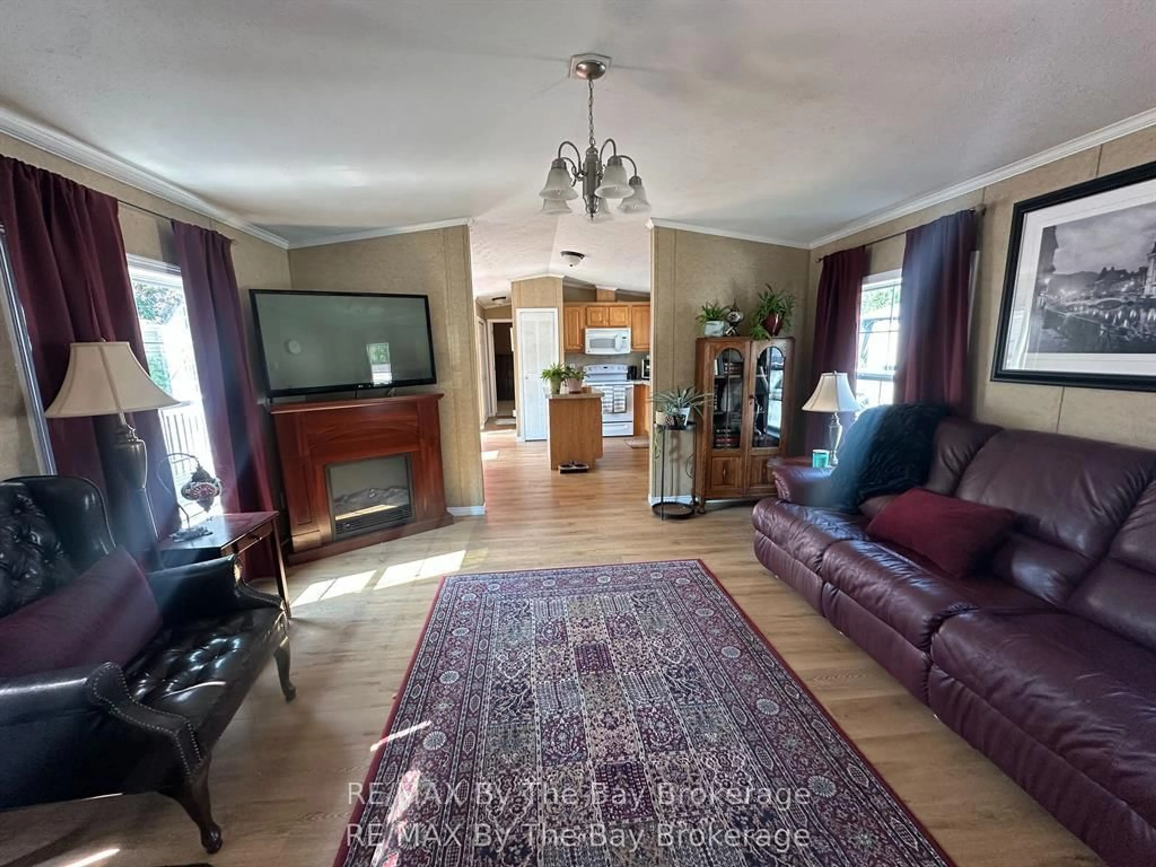 Living room with furniture, unknown for 40 Georgian Glen Dr, Wasaga Beach Ontario L9Z 1K7
