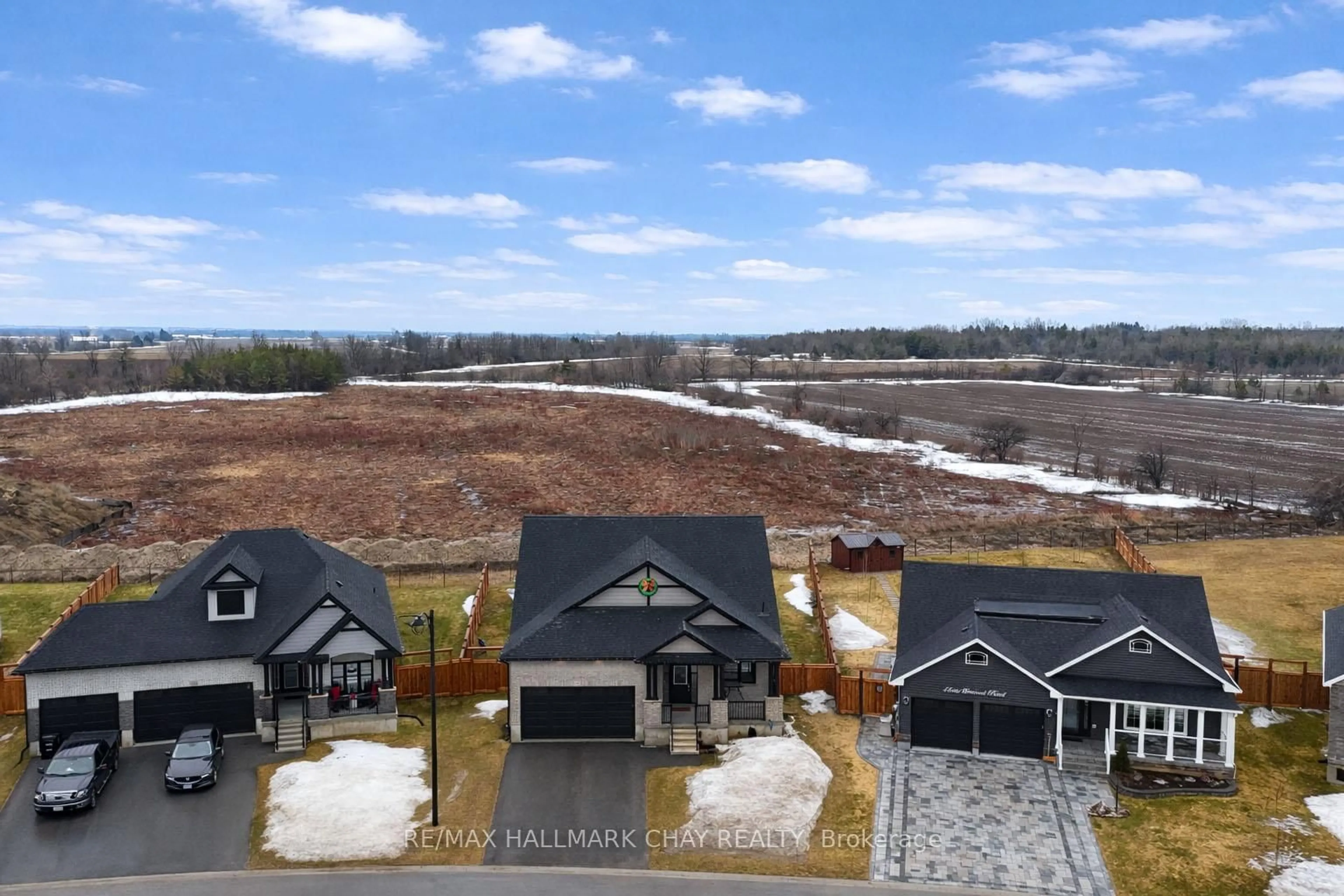 A pic from outside/outdoor area/front of a property/back of a property/a pic from drone, water/lake/river/ocean view for 47 Allenwood Rd, Springwater Ontario L0L 1P0