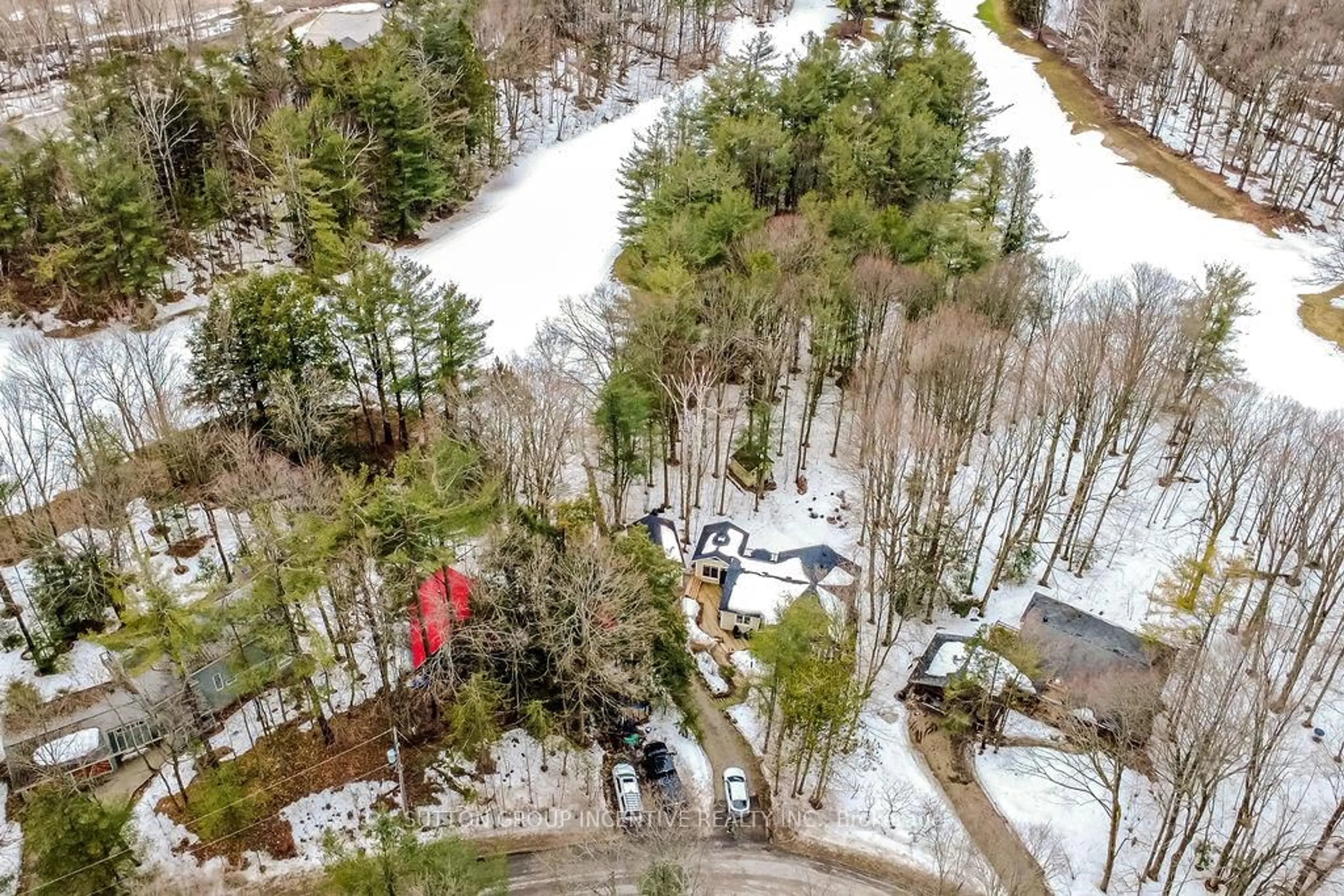 A pic from outside/outdoor area/front of a property/back of a property/a pic from drone, forest/trees view for 11 Beechwood Rd, Oro-Medonte Ontario L4M 4Y8
