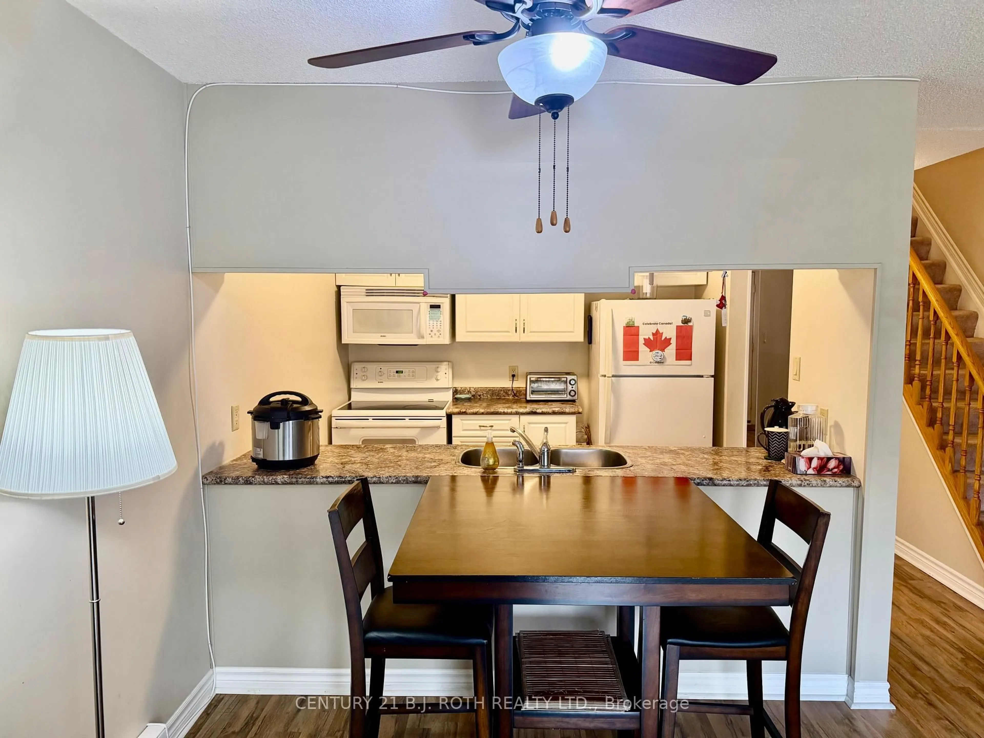 Open concept kitchen, wood/laminate floor for 51 Laguna Pkwy #16, Ramara Ontario L0K 1B0