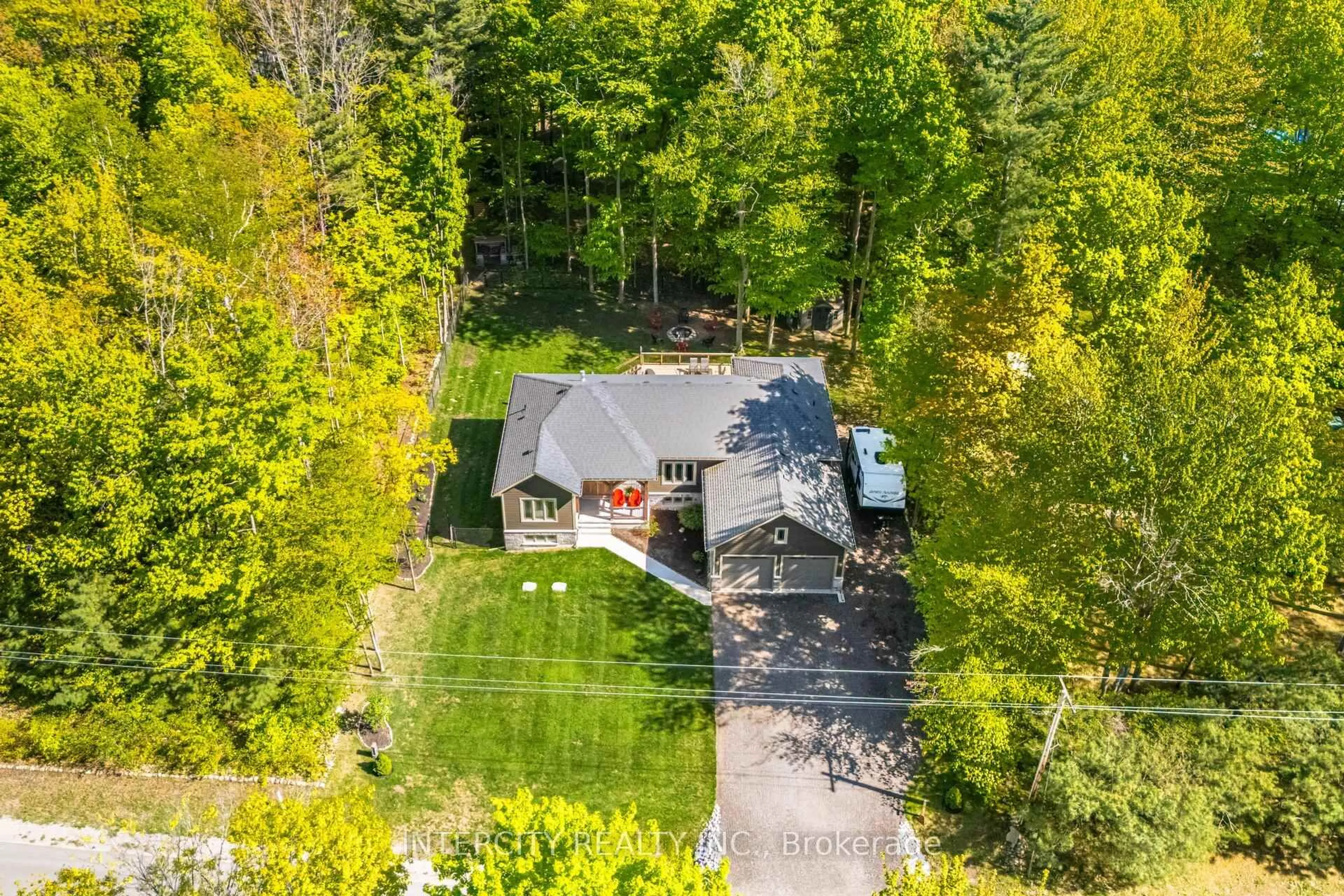 A pic from outside/outdoor area/front of a property/back of a property/a pic from drone, forest/trees view for 41 Tall Pines Dr, Tiny Ontario L9M 0H4