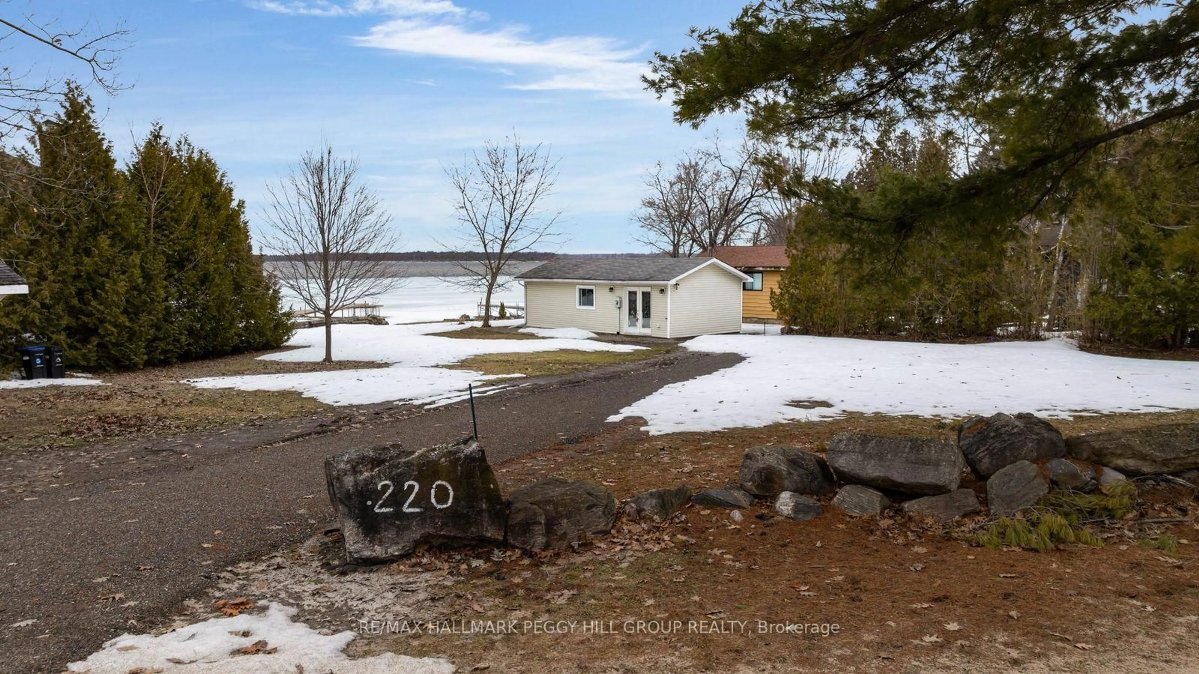 A pic from outside/outdoor area/front of a property/back of a property/a pic from drone, water/lake/river/ocean view for 220 Robins Point Rd, Tay Ontario L0K 2A0