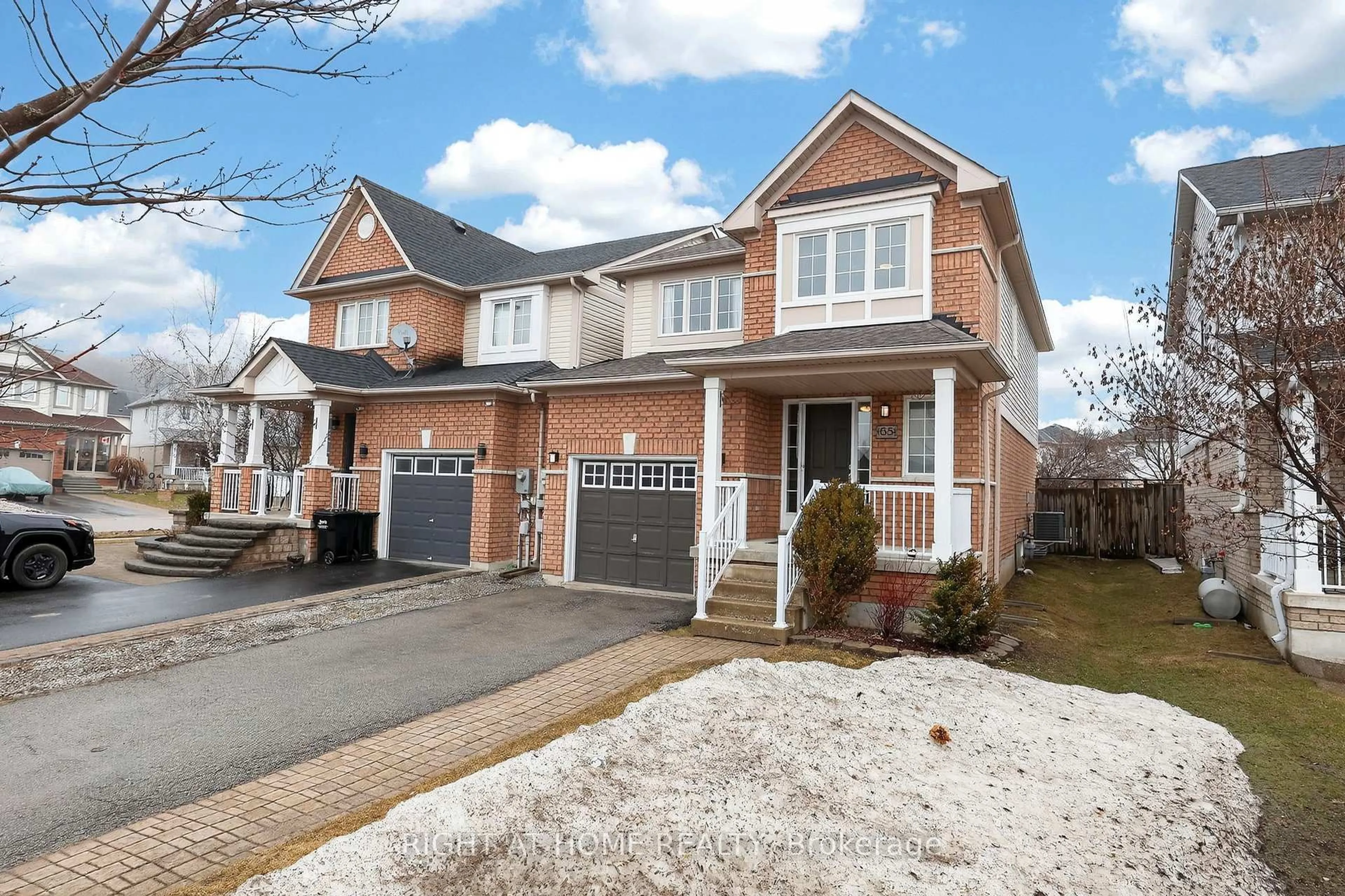 Home with brick exterior material, street for 65 Bird St, Barrie Ontario L4N 0X2