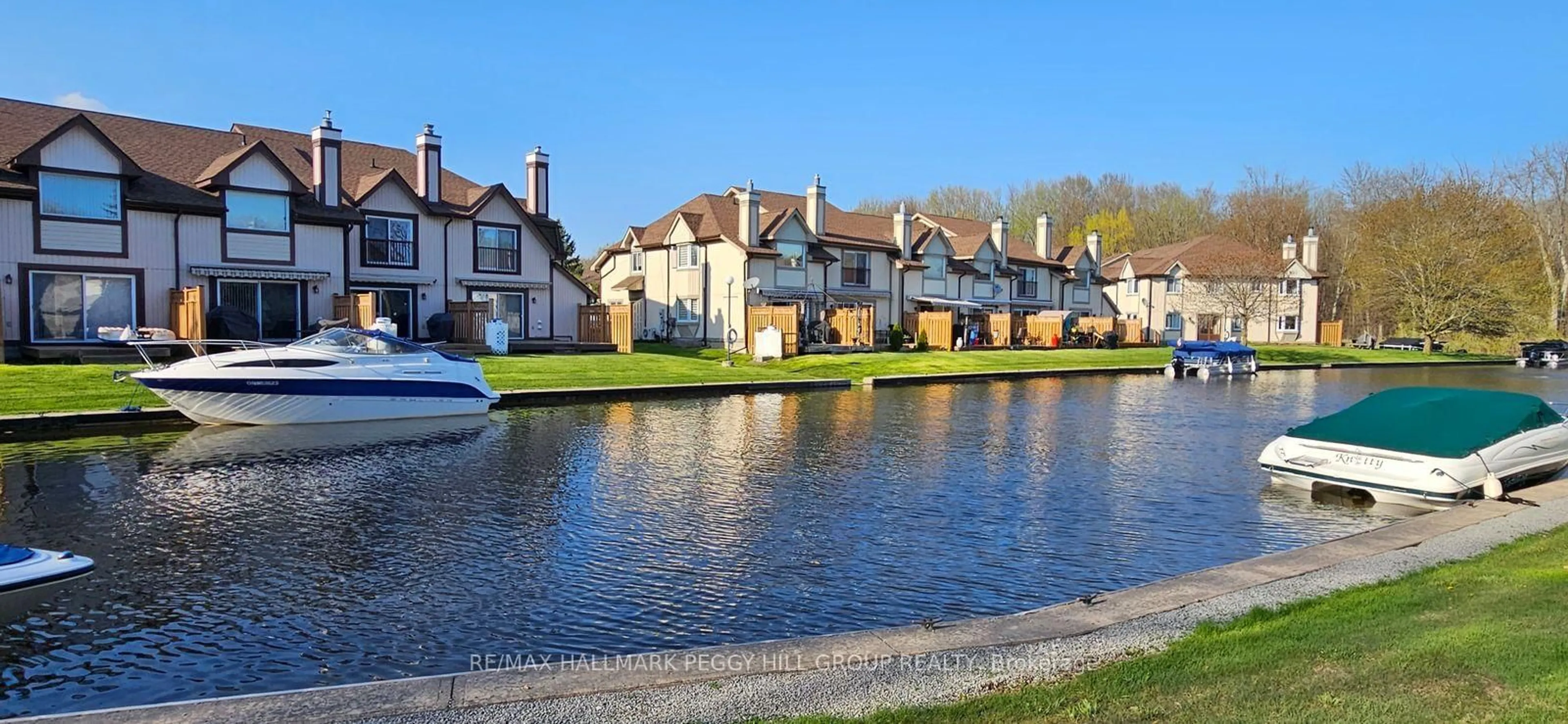 A pic from outside/outdoor area/front of a property/back of a property/a pic from drone, water/lake/river/ocean view for 11 Laguna Pkwy #4, Ramara Ontario L0K 1B0