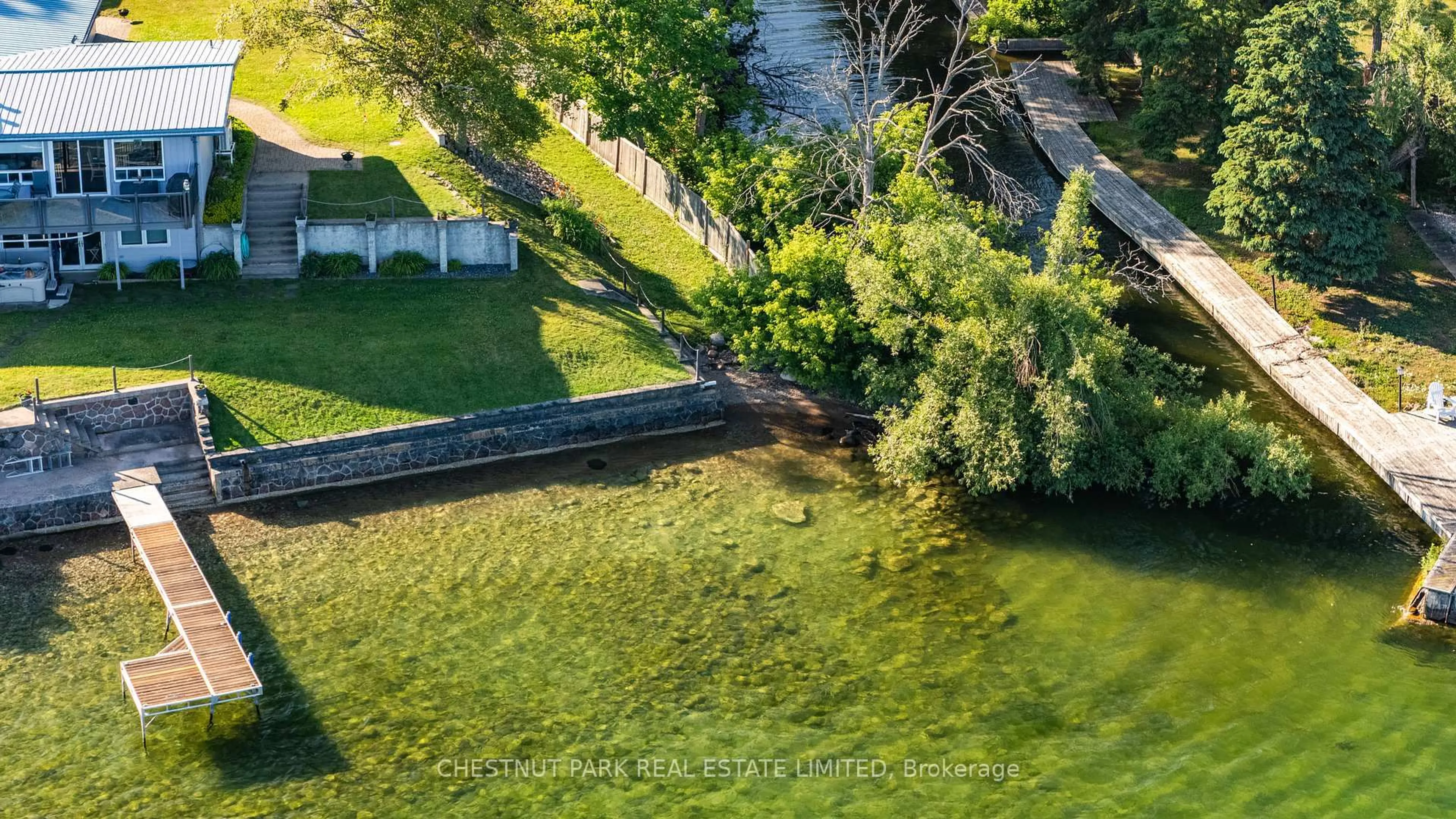 A pic from outside/outdoor area/front of a property/back of a property/a pic from drone, water/lake/river/ocean view for 47 Lakeshore Rd, Oro-Medonte Ontario L0L 2E0