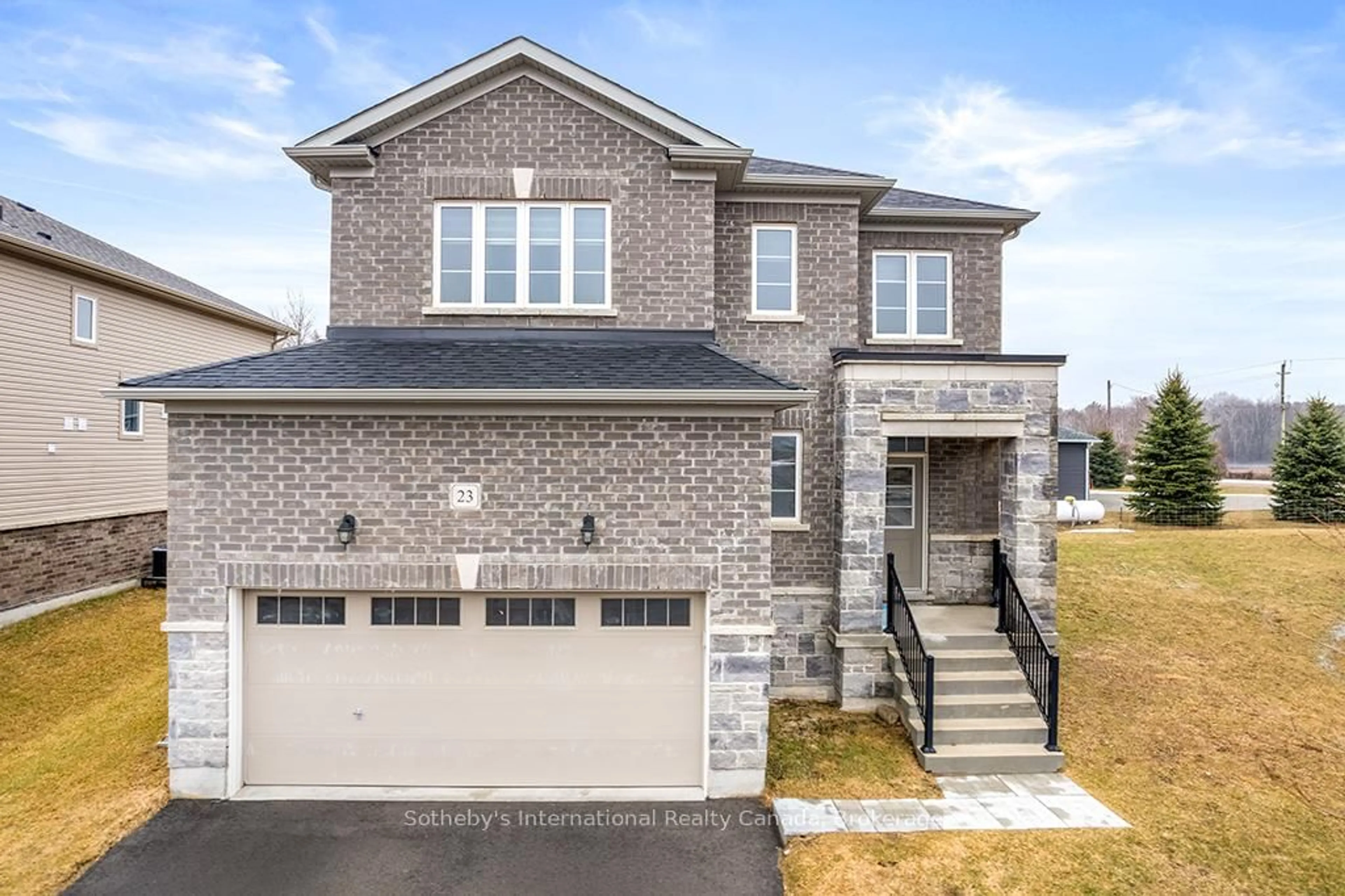 Home with brick exterior material, street for 23 Autumn Dr, Wasaga Beach Ontario L9Z 0K7