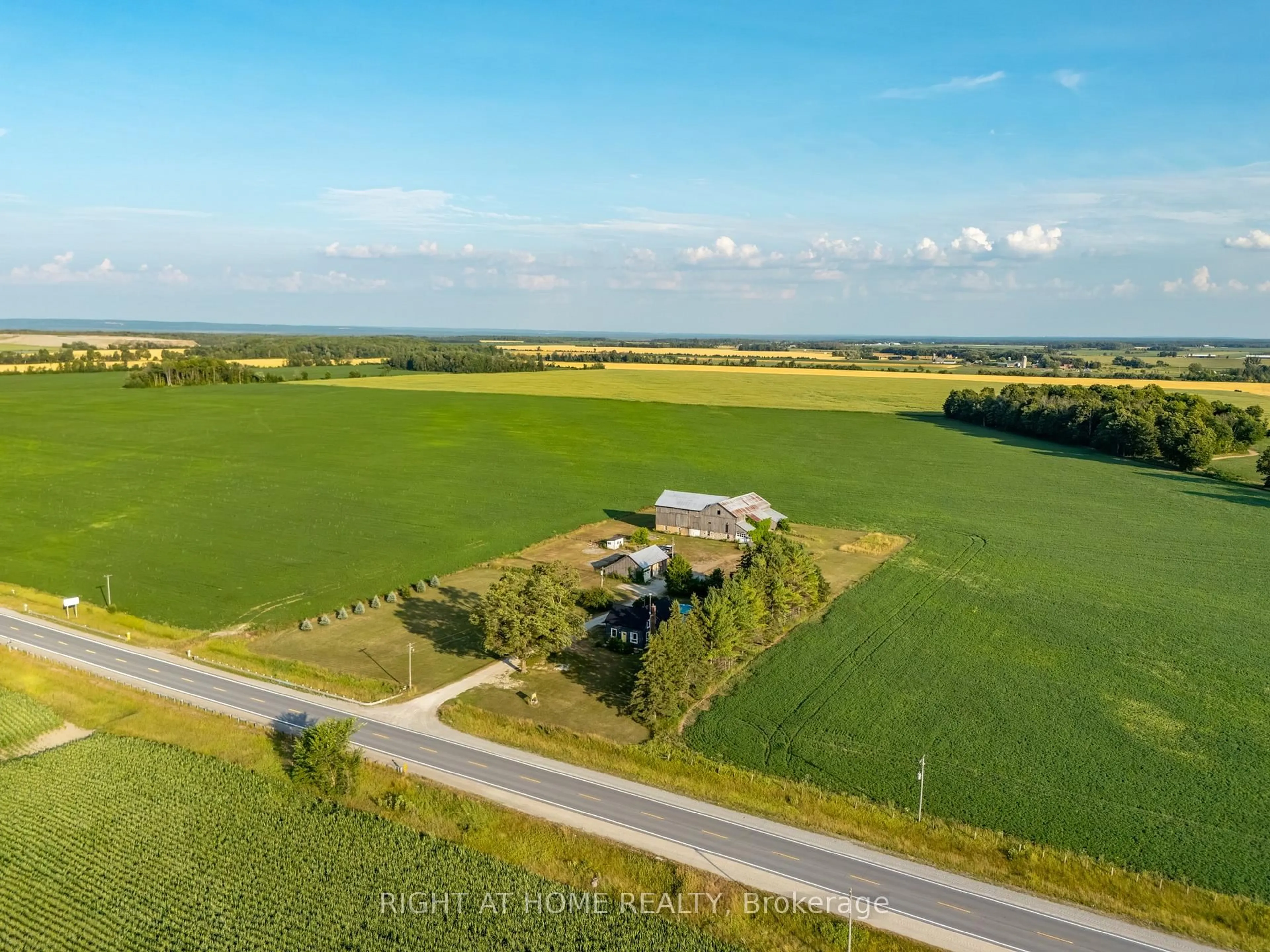 A pic from outside/outdoor area/front of a property/back of a property/a pic from drone, unknown for 5803 26 Highway, Clearview Ontario L0M 1S0