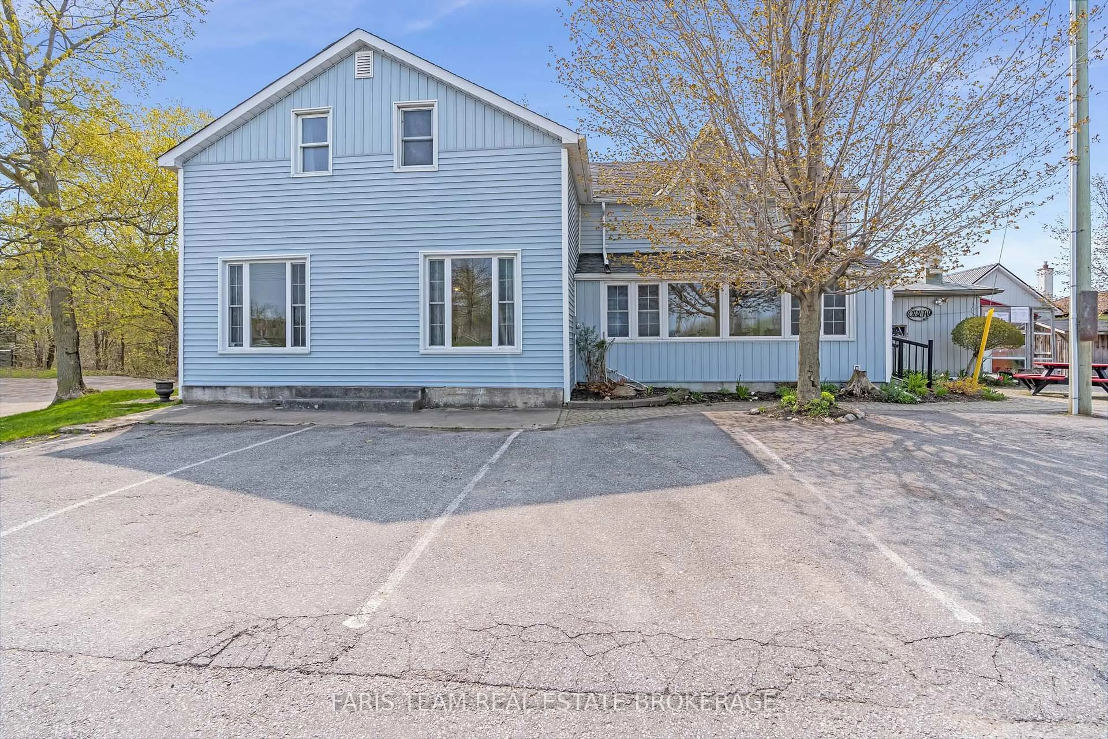 A pic from outside/outdoor area/front of a property/back of a property/a pic from drone, street for 4047 Horseshoe Valley Rd, Springwater Ontario L9X 0Z6