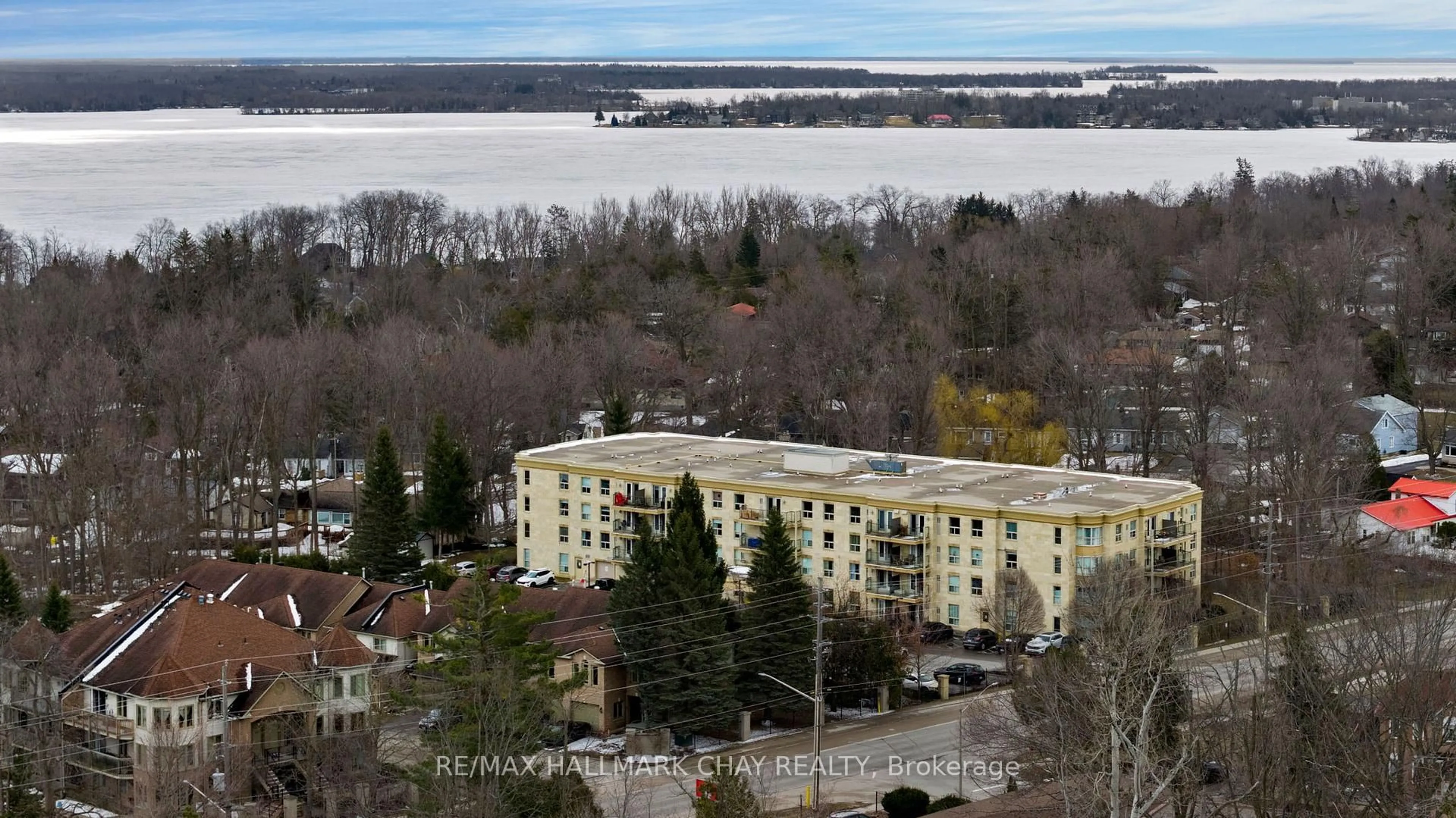 A pic from outside/outdoor area/front of a property/back of a property/a pic from drone, water/lake/river/ocean view for 486 Laclie St #109, Orillia Ontario L3V 4P9