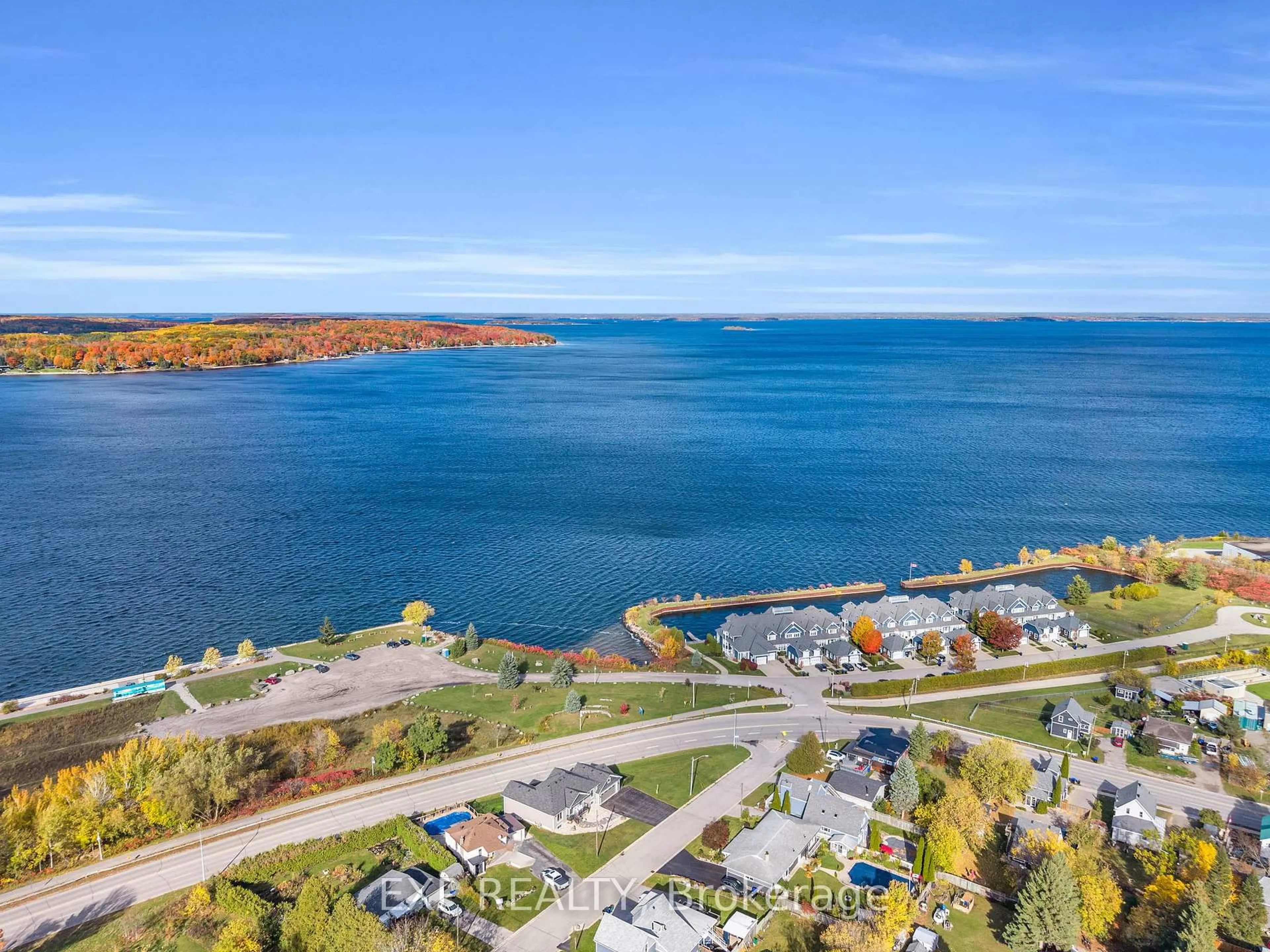 A pic from outside/outdoor area/front of a property/back of a property/a pic from drone, water/lake/river/ocean view for 244 Frank St, Midland Ontario L4R 1H4