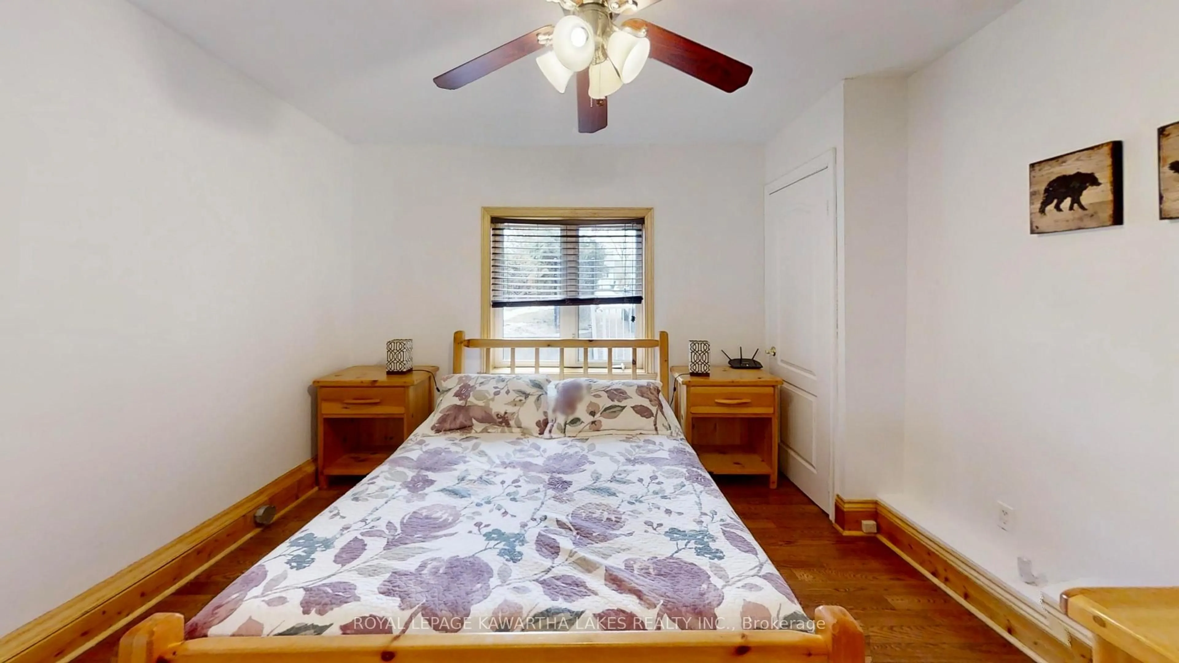 Bedroom with bed, wood/laminate floor for 1136 Sylvan Glen Dr, Ramara Ontario L0K 1B0