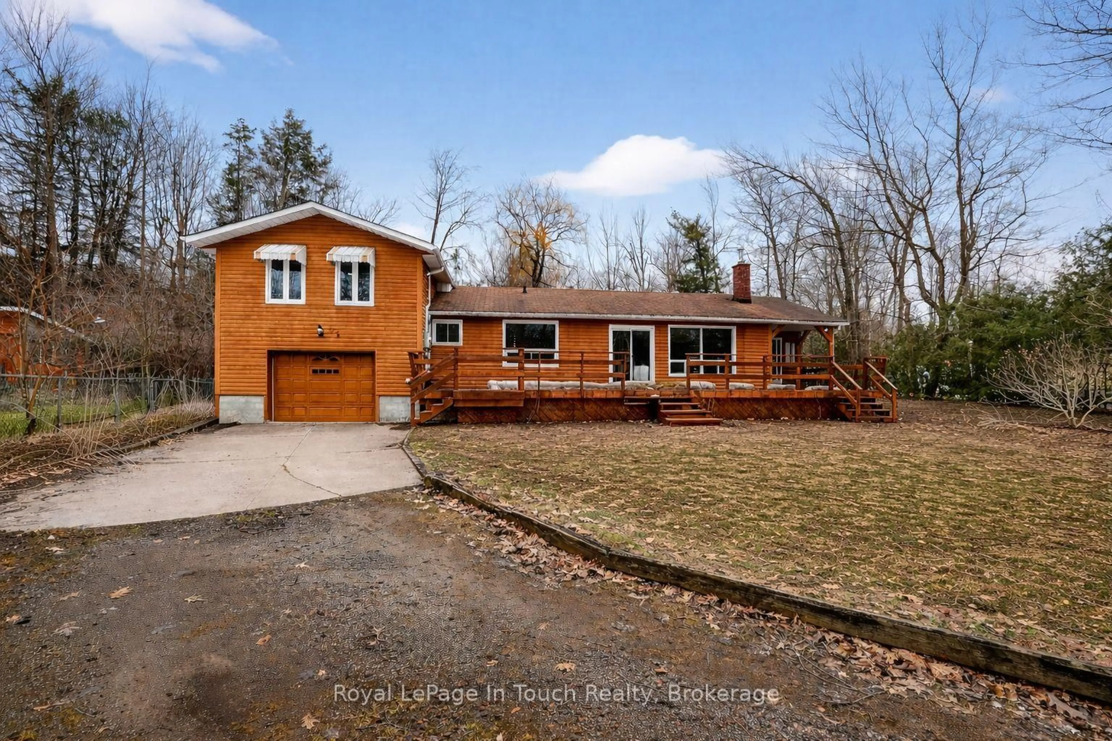 A pic from outside/outdoor area/front of a property/back of a property/a pic from drone, street for 23 Duquette Crt, Tiny Ontario L9M 0H3