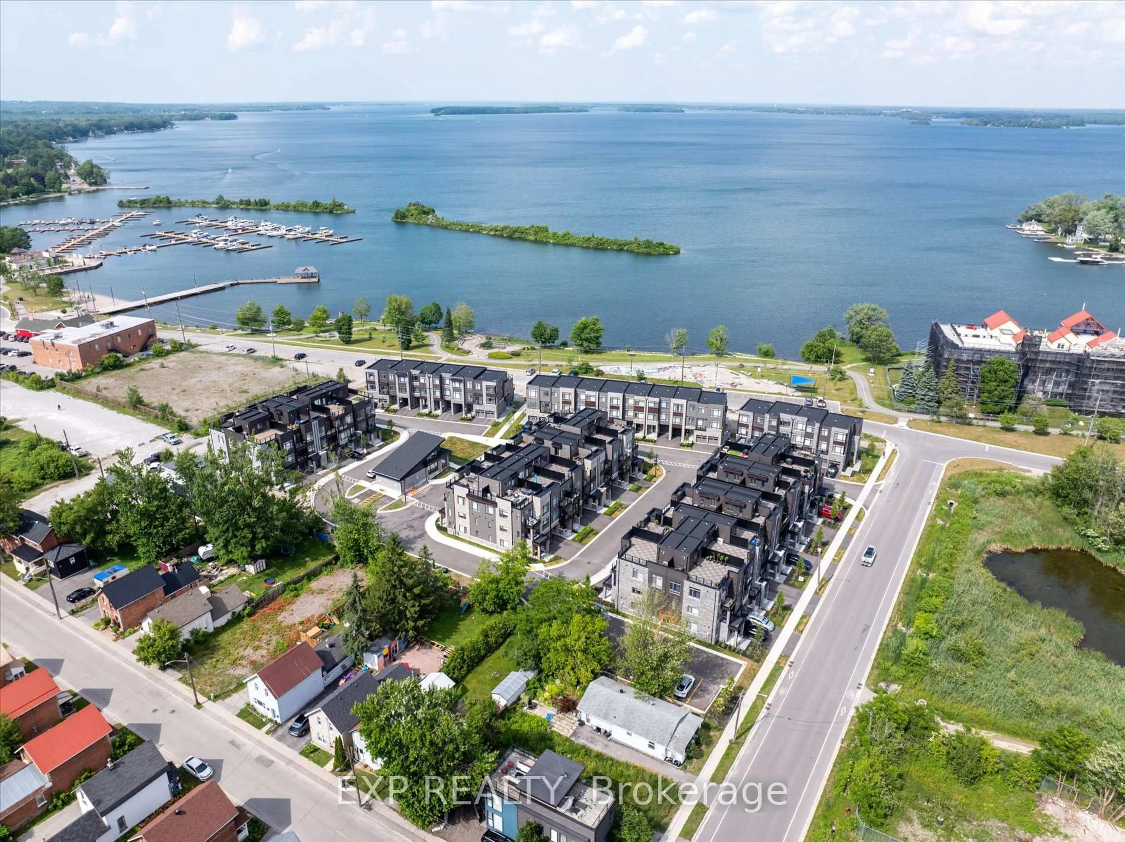 A pic from outside/outdoor area/front of a property/back of a property/a pic from drone, water/lake/river/ocean view for 48 Wyn Wood Lane, Orillia Ontario L3V 8P7