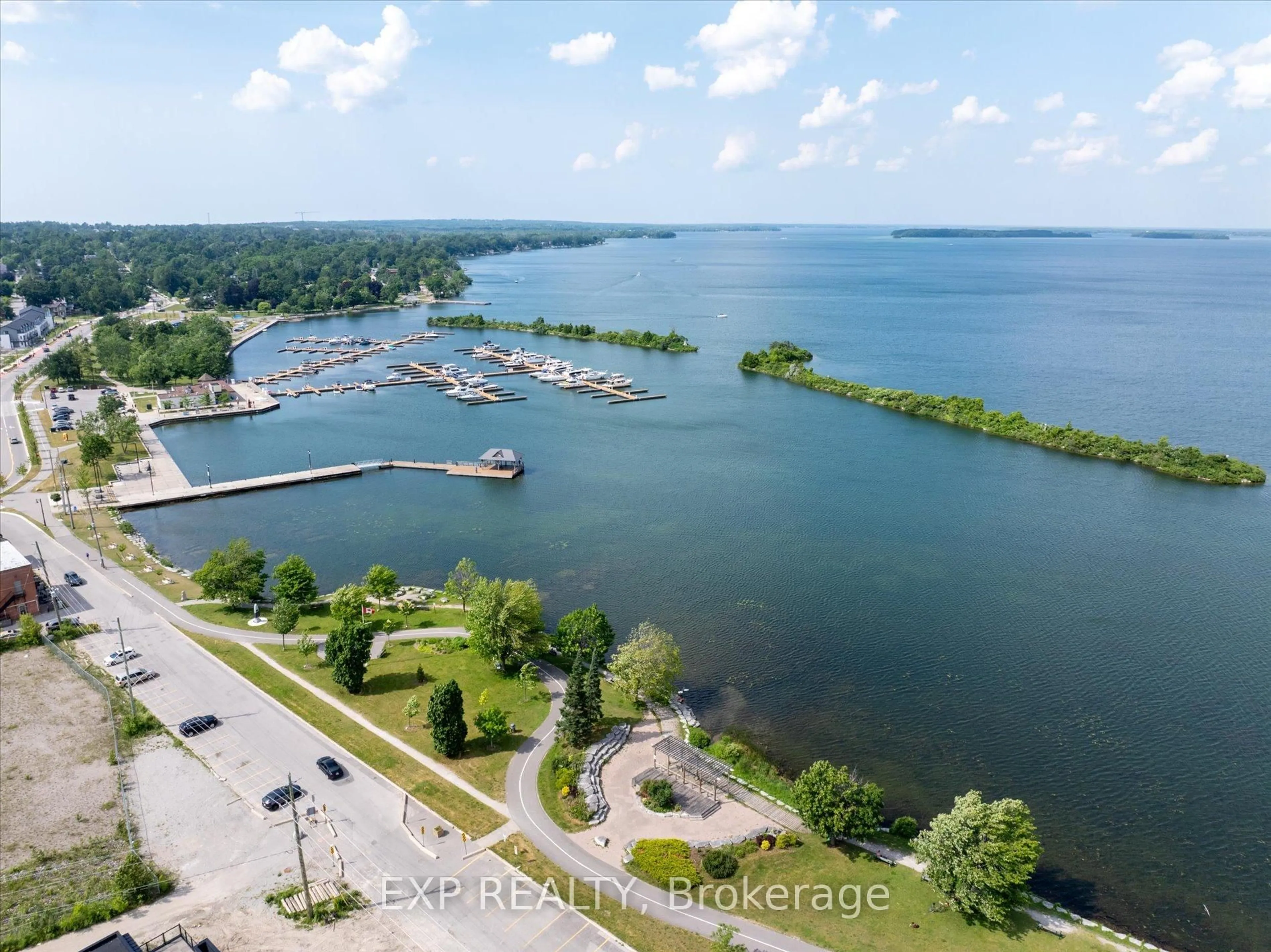 A pic from outside/outdoor area/front of a property/back of a property/a pic from drone, water/lake/river/ocean view for 48 Wyn Wood Lane, Orillia Ontario L3V 8P7