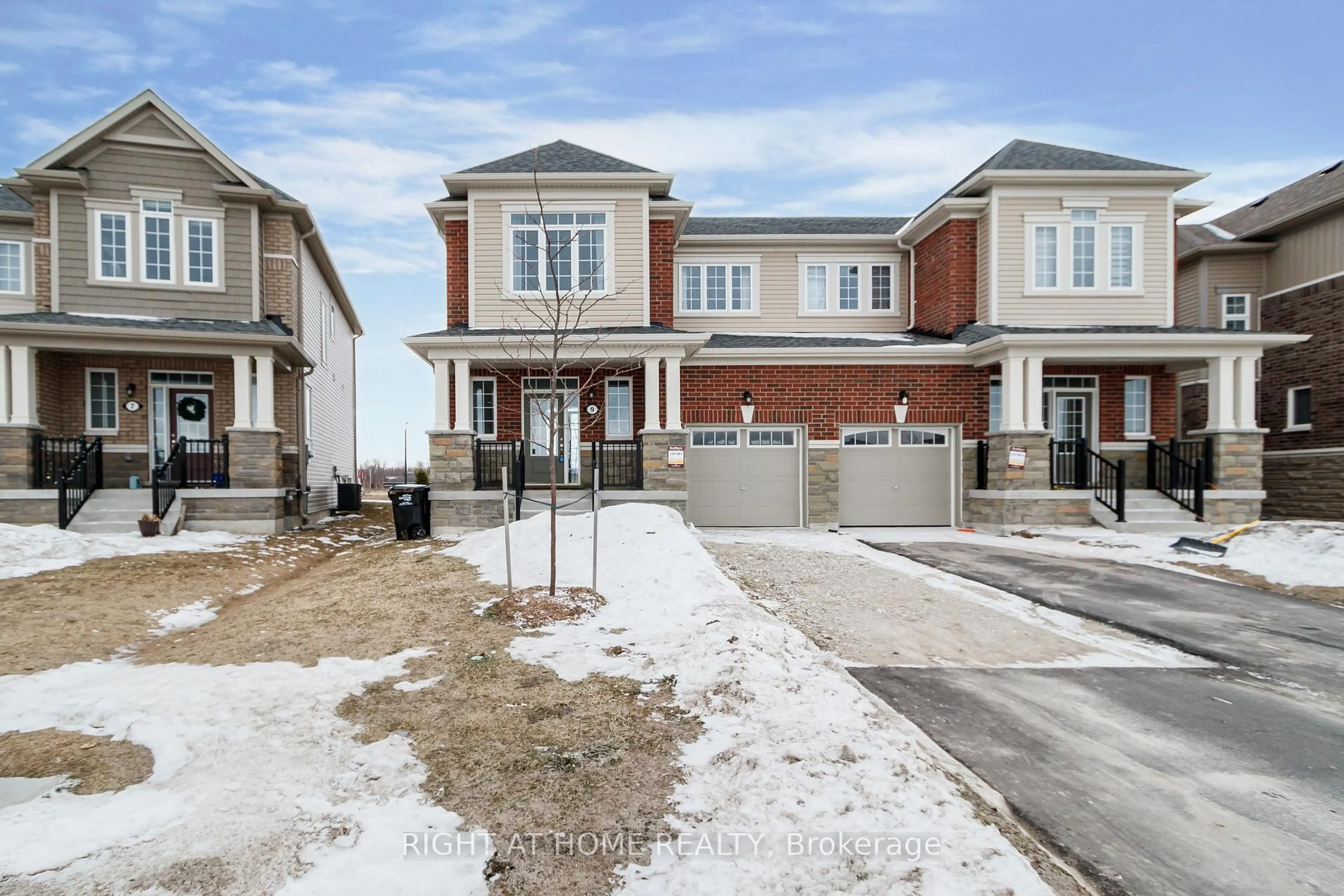 Home with brick exterior material, street for 9 Mission St, Wasaga Beach Ontario L9Z 0L8