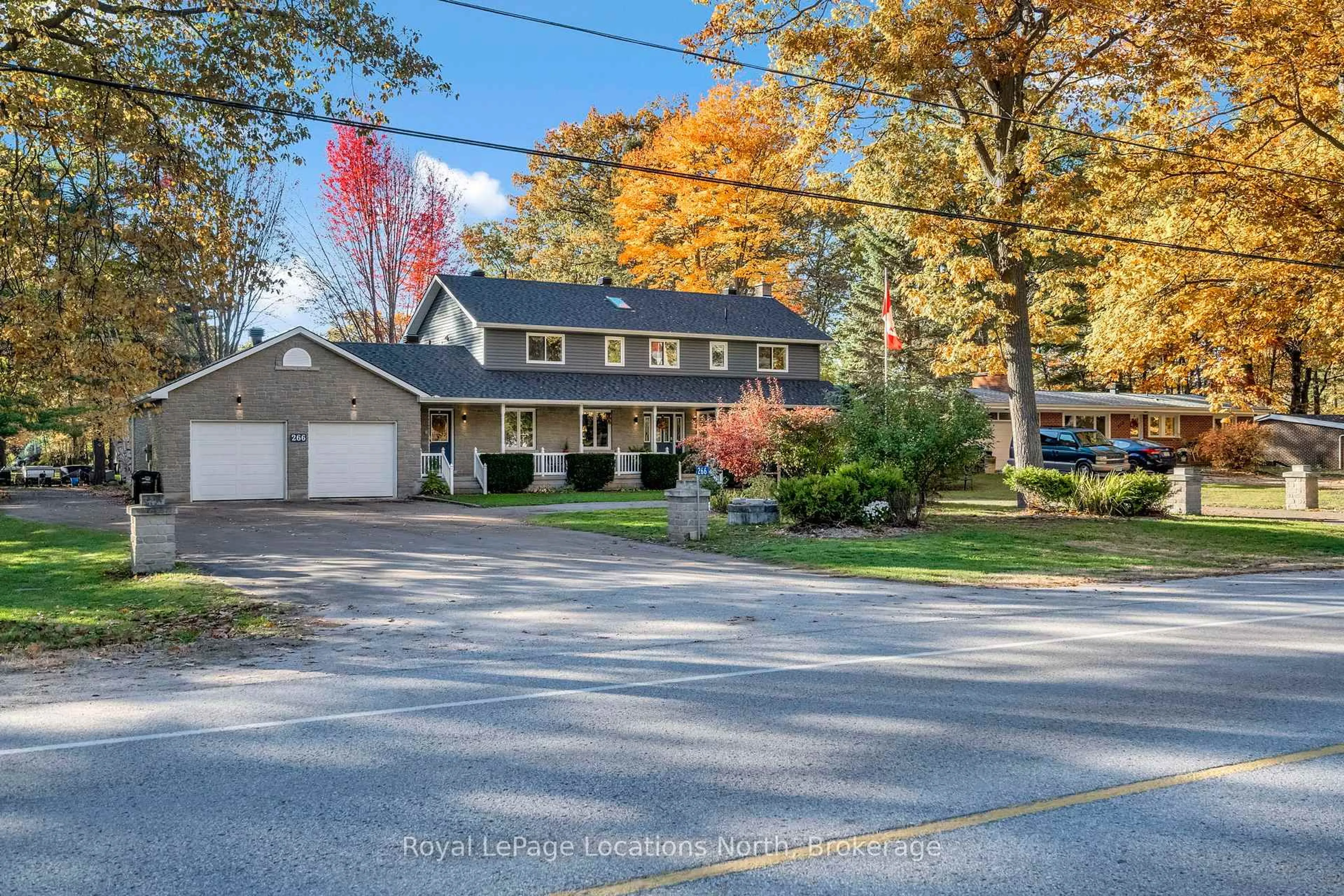 A pic from outside/outdoor area/front of a property/back of a property/a pic from drone, street for 266 45th St, Wasaga Beach Ontario L9Z 1R3