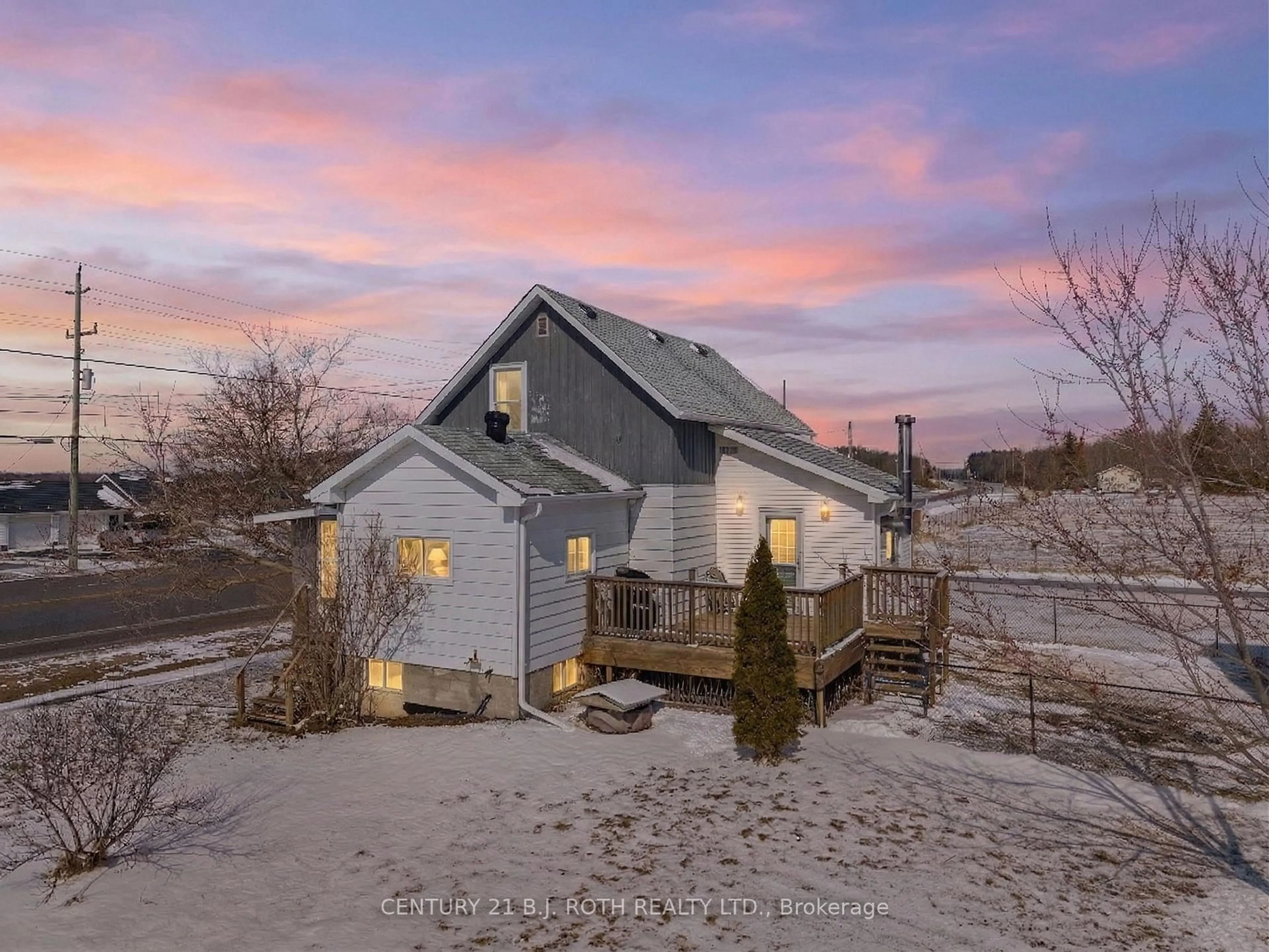 A pic from outside/outdoor area/front of a property/back of a property/a pic from drone, street for 1006 FLOS 4 Rd, Springwater Ontario L0L 2K0